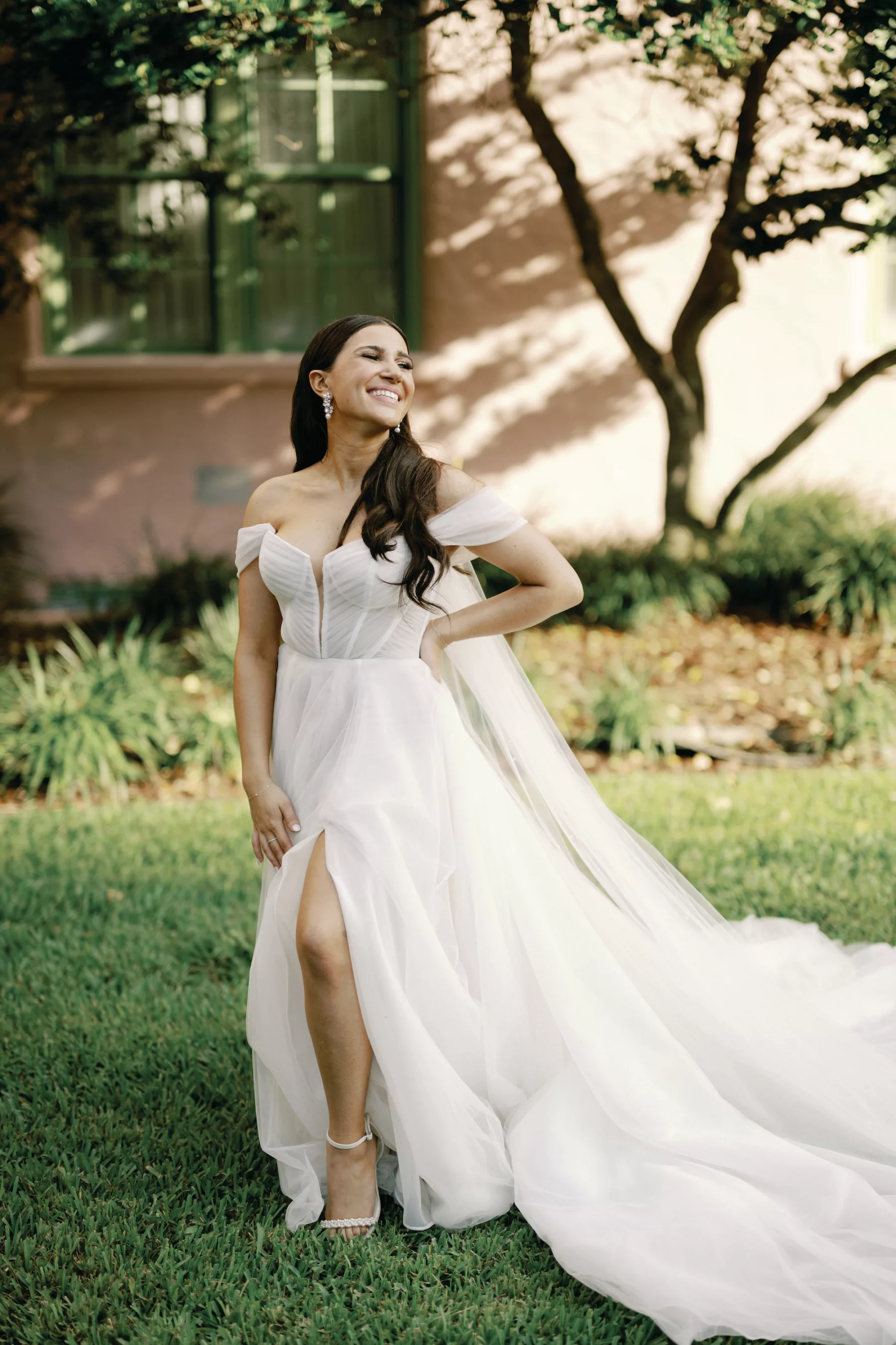 Ivory Off The Shoulder Boned Bodice Chiffon A Line Martina Liana Wedding Dress Inspiration | Romantic Bridal Hair and Makeup Ideas | Bride Reading Card from Groom on Wedding Day | Tampa Bay Content Creator Behind The Vows | Photographer Dewitt for Love Photography