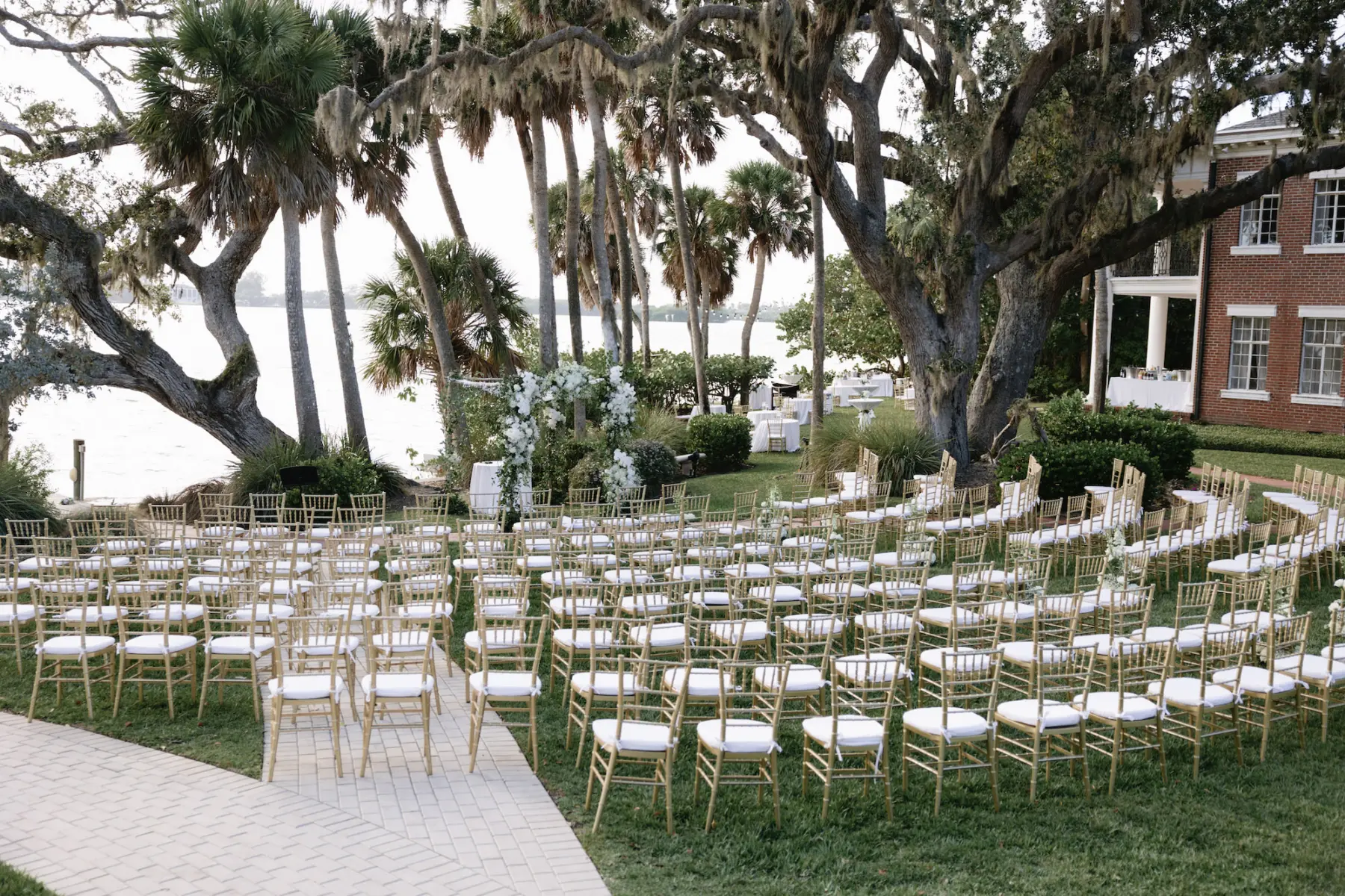 Classic Waterfront Wedding Ceremony Decor Ideas | Gold Chiavari Chairs | Tampa Bay Florist Beneva Florals
