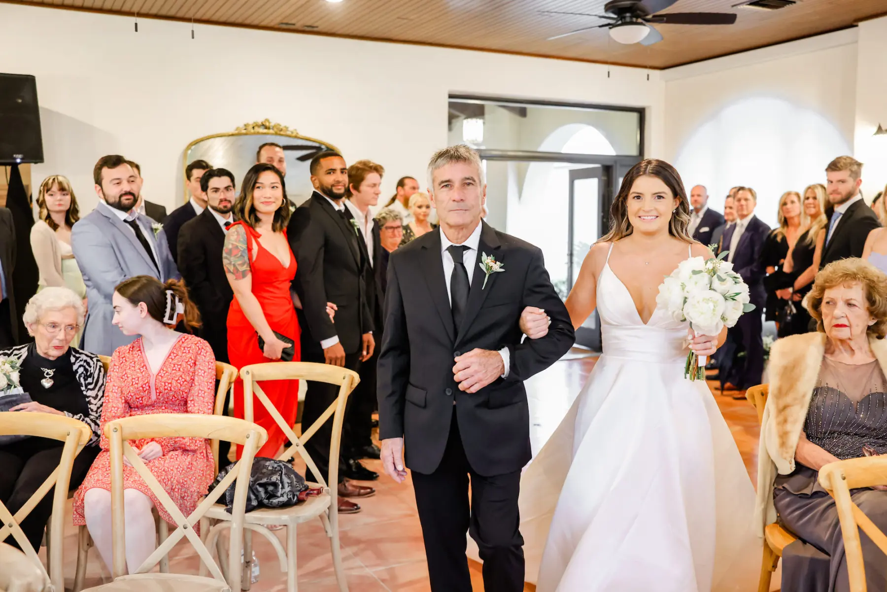 Bride and Father Walking Down Wedding Aisle