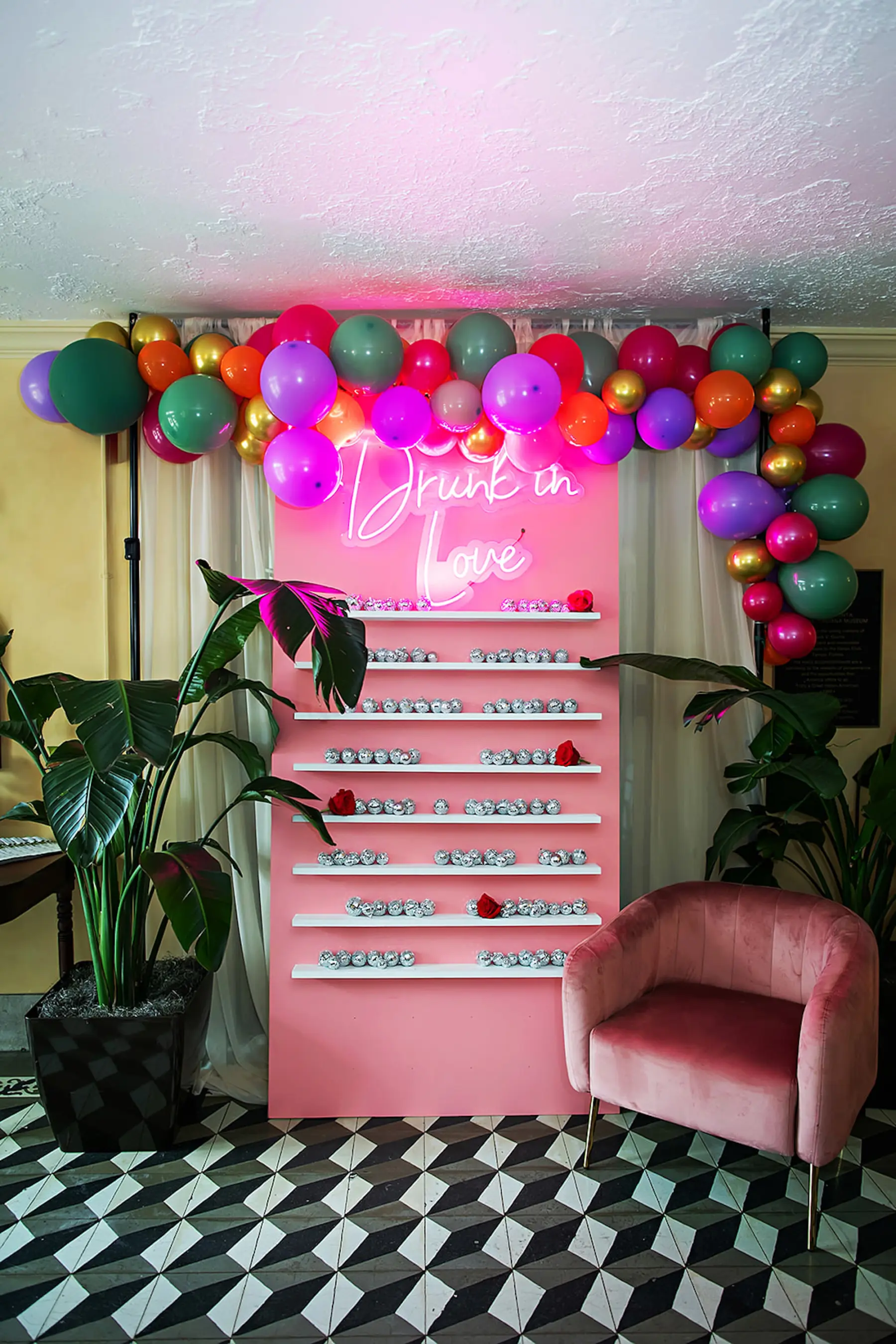 Whimsical Drunk In Love Neon Sign Wedding Reception Seating Chart Display Ideas | Disco Ball and Balloon Arch Decor Inspiration