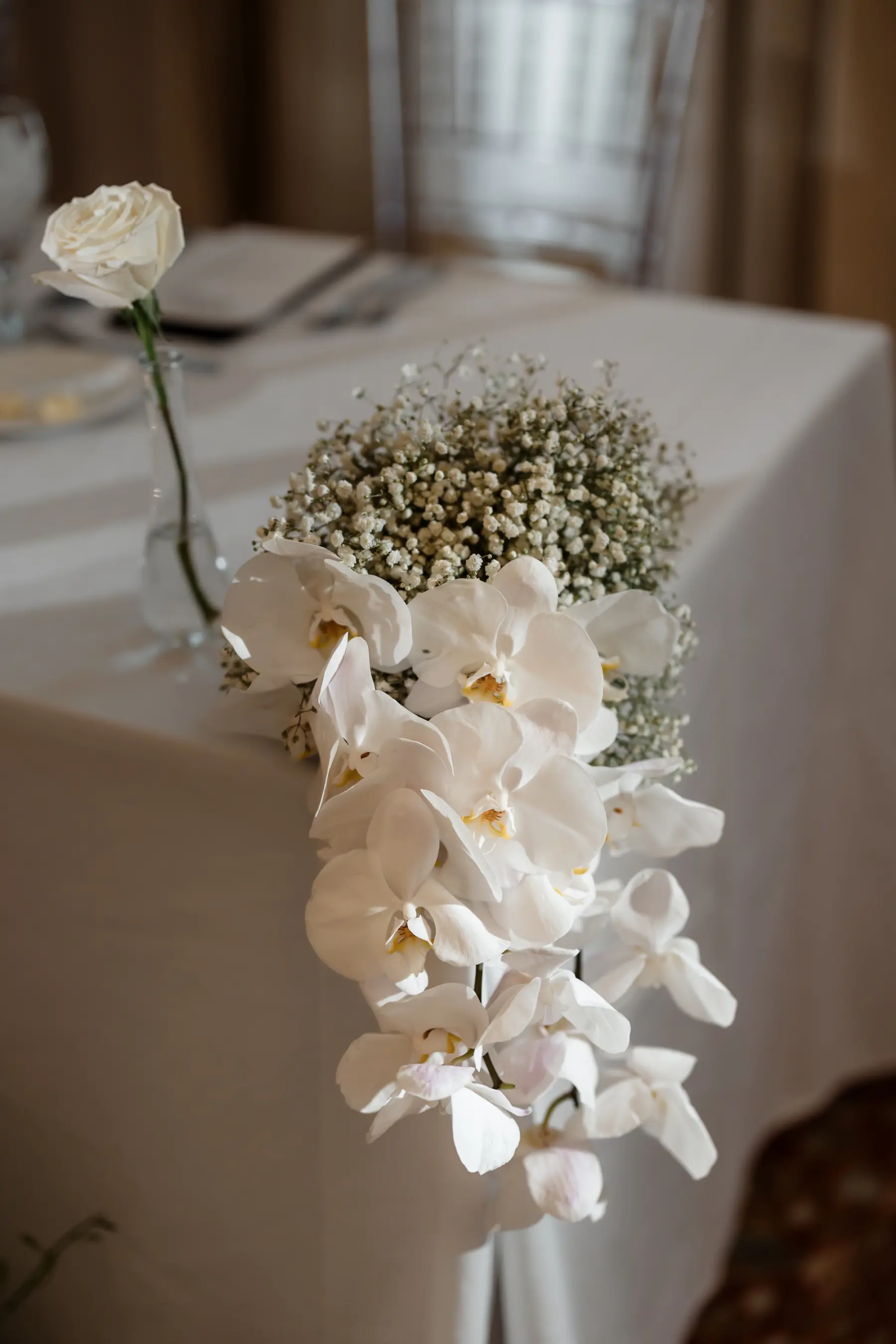 Cascading White Orchids and Baby's Breath Wedding Reception Tabletop Decor Ideas