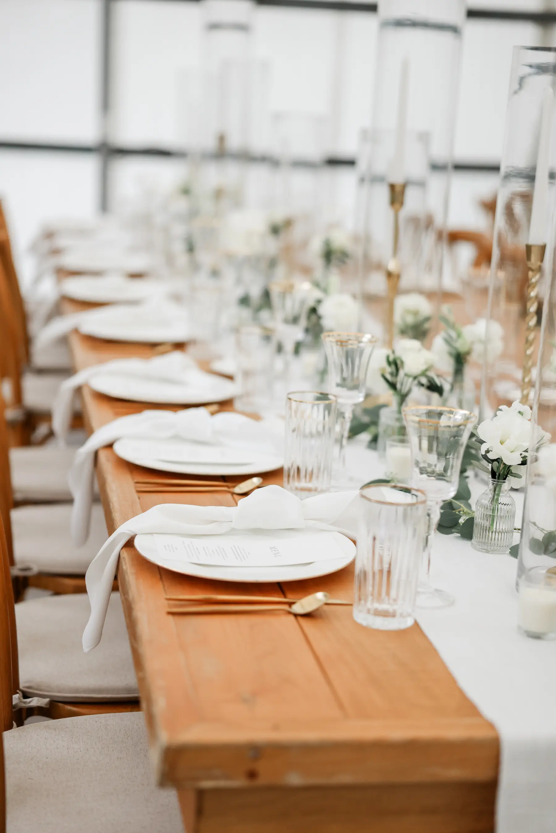 Classic White and Gold Wedding Reception Place Setting Inspiration | Gold Flatware | Modern Black and White Menu Cart | Ribbed Gold Rimmed Glass |Tampa Bay Kate Ryan Event Rentals