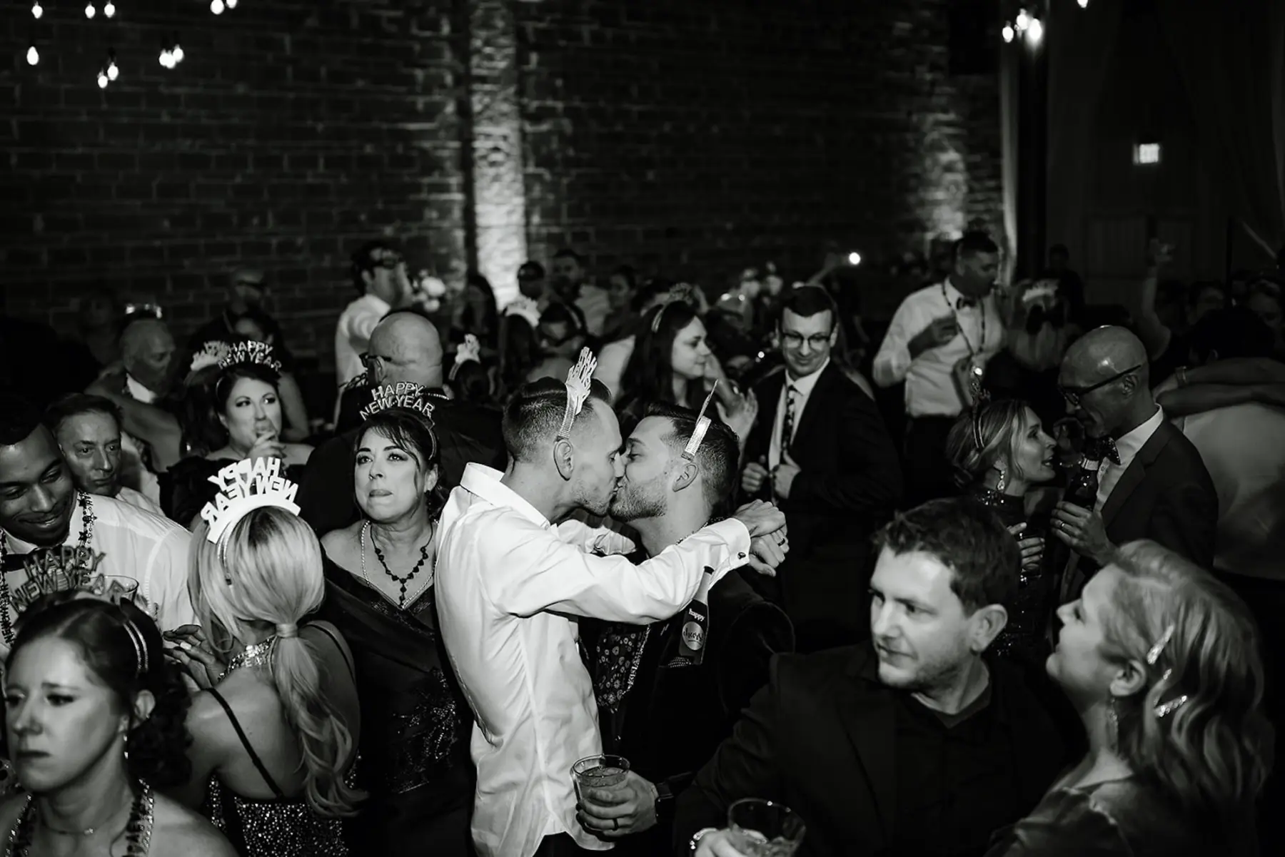 Groom and Groom New Years Eve Wedding Reception Kiss | Tampa Bay Photographer Iyrus Weddings