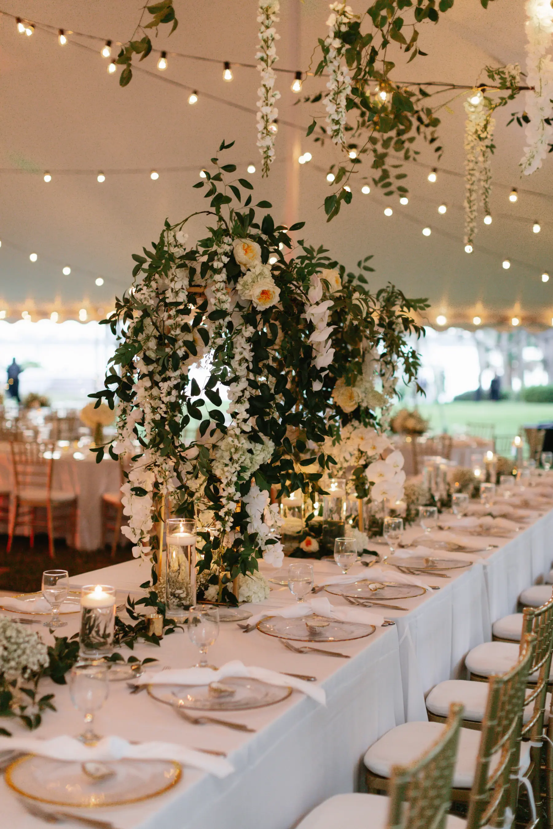 Whimsical White and Gold Wedding Reception Tablescape with White Roes, Orchids, Greenery, and Wisteria | Tampa Bay Florist Beneva Florals