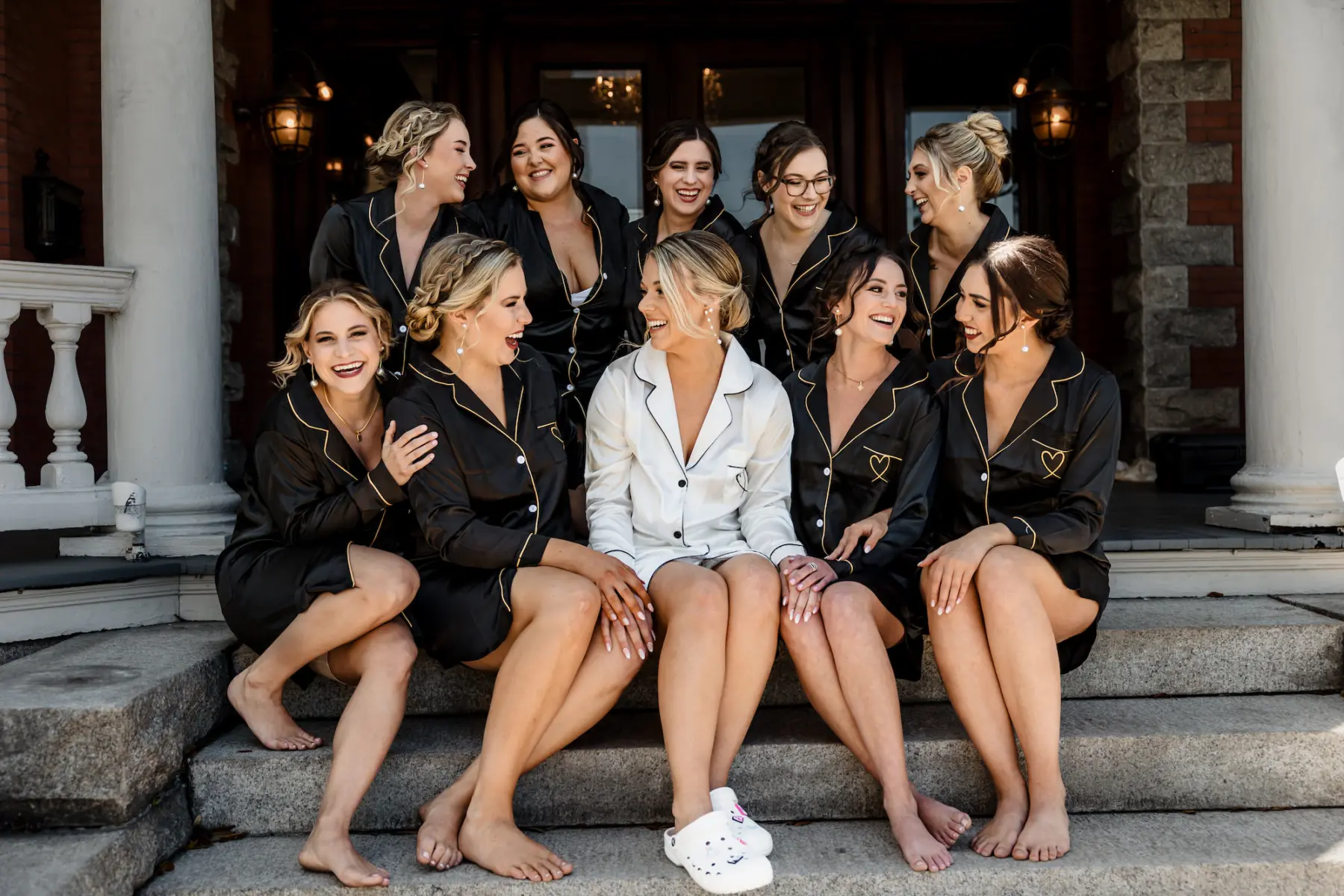 Bride and Bridesmaid Updo Hair and Makeup Inspiration | Matching Satin Black and Gold Pajamas Ideas | Tampa Bay Hair and Makeup Artist Adore Bridal Services