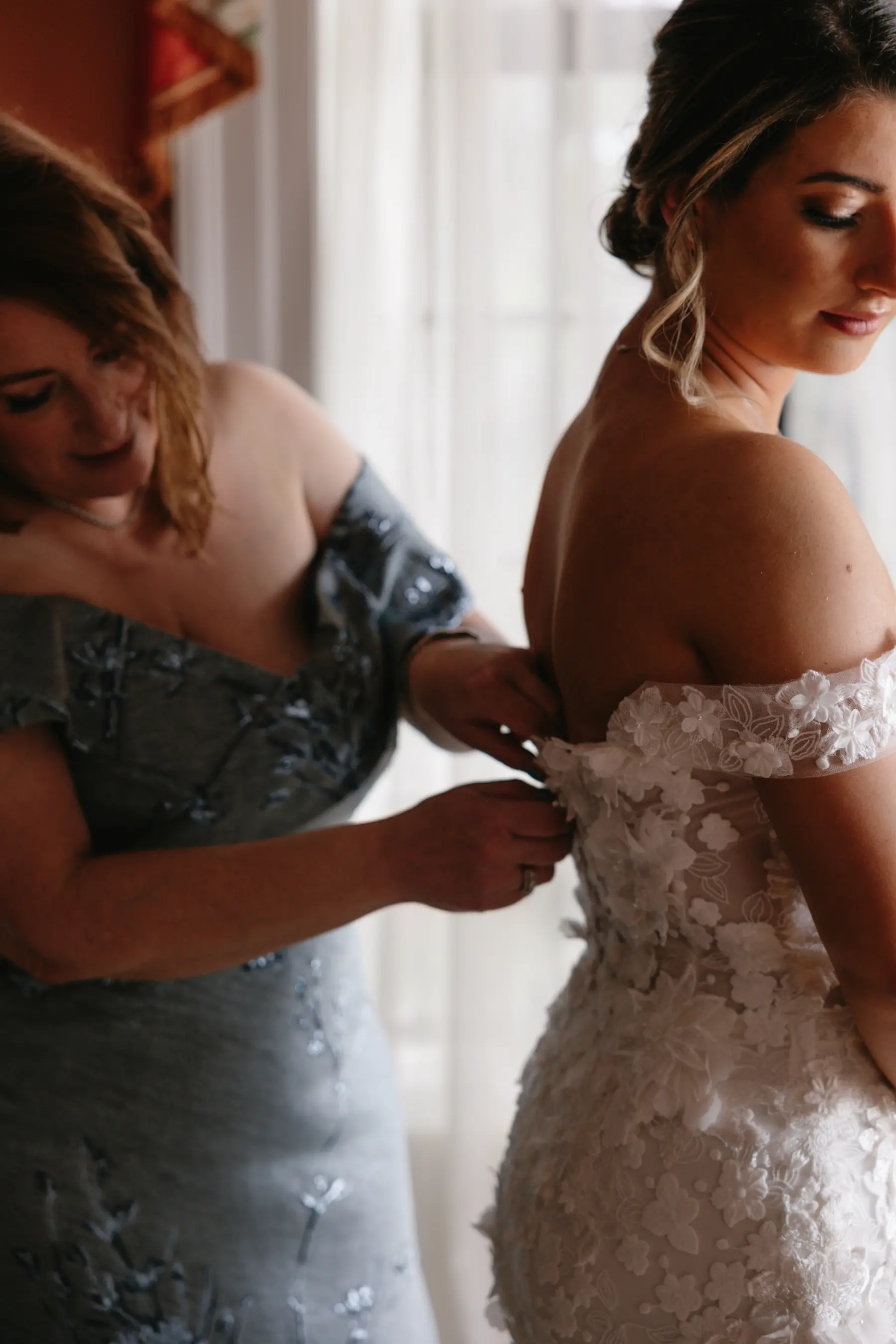 Bride and Mother Getting Ready Wedding Portrait | White Off The Shoulder Lace Fit and Flare Milla Nova Wedding Dress Ideas | Classic Bridal Updo Inspiration | Sarasota Hair and Makeup Artist Femme Akoi Beauty Studio