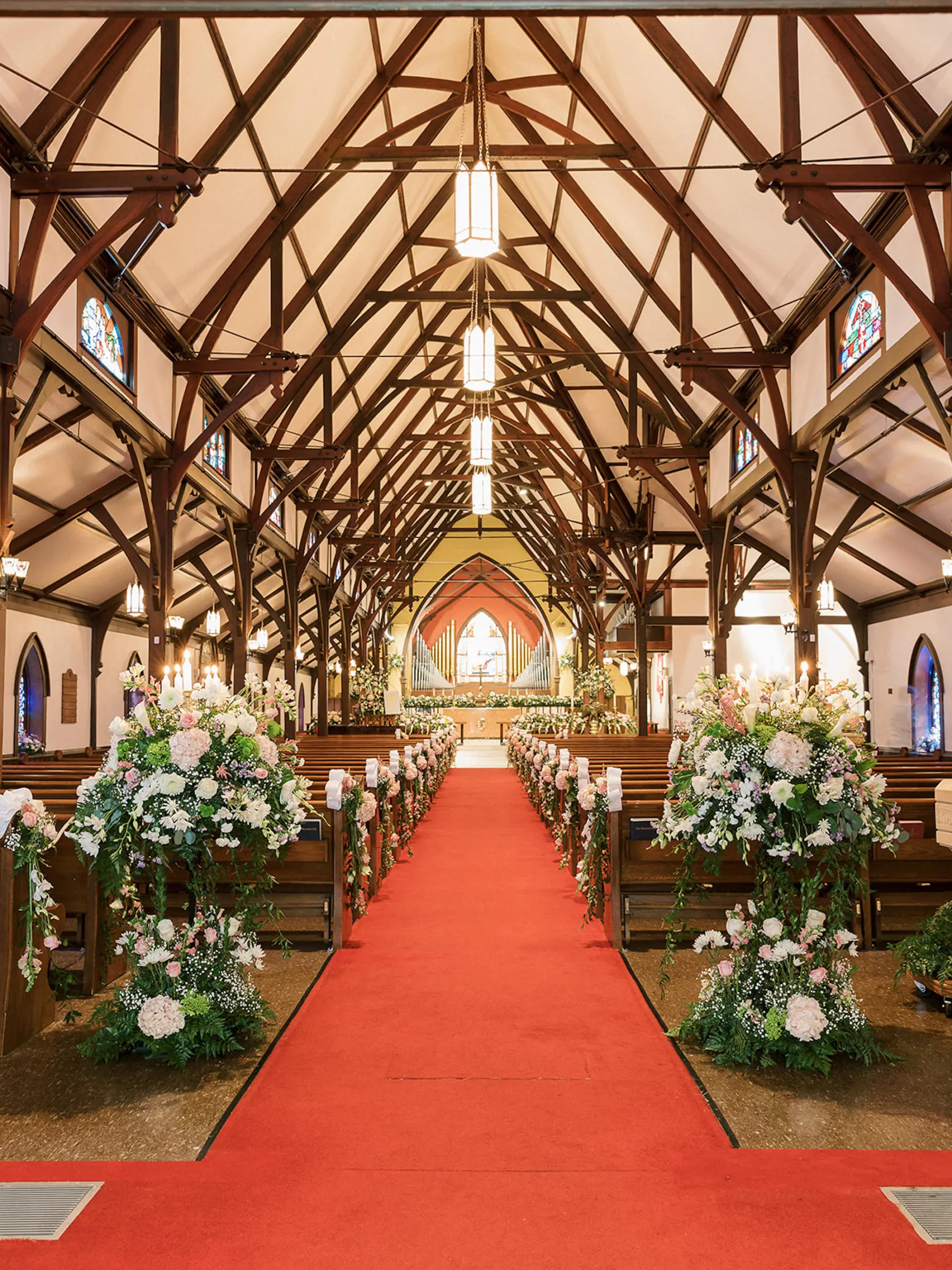 Episcopal Church Wedding Ceremony Aisle Decor Ideas | White Daisy, Roses, Calla Lily, Hydrangea, Baby's Breath, and Greenery Floral Arrangement Inspiration | Tampa Bay Planner Unique Weddings and Events | Cathedral Church of St. Peter St Pete