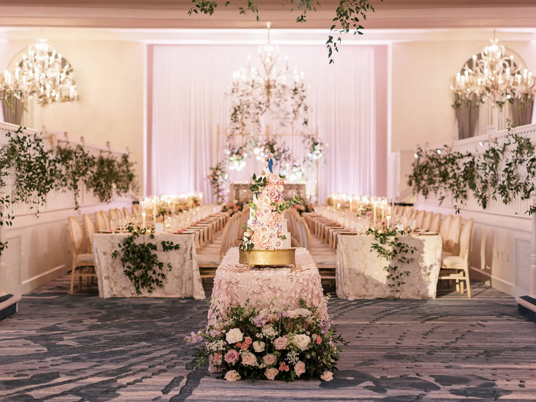 Whimsical Bridgerton Ballroom Wedding Reception Cake Table Inspiration | Cascading Pink Roses on Five-Tiered Wedding Cake Ideas | Tampa Bay Event Venue Don CeSar | St Pete Rental A Chair Affair | Kate Ryan Event Rentals