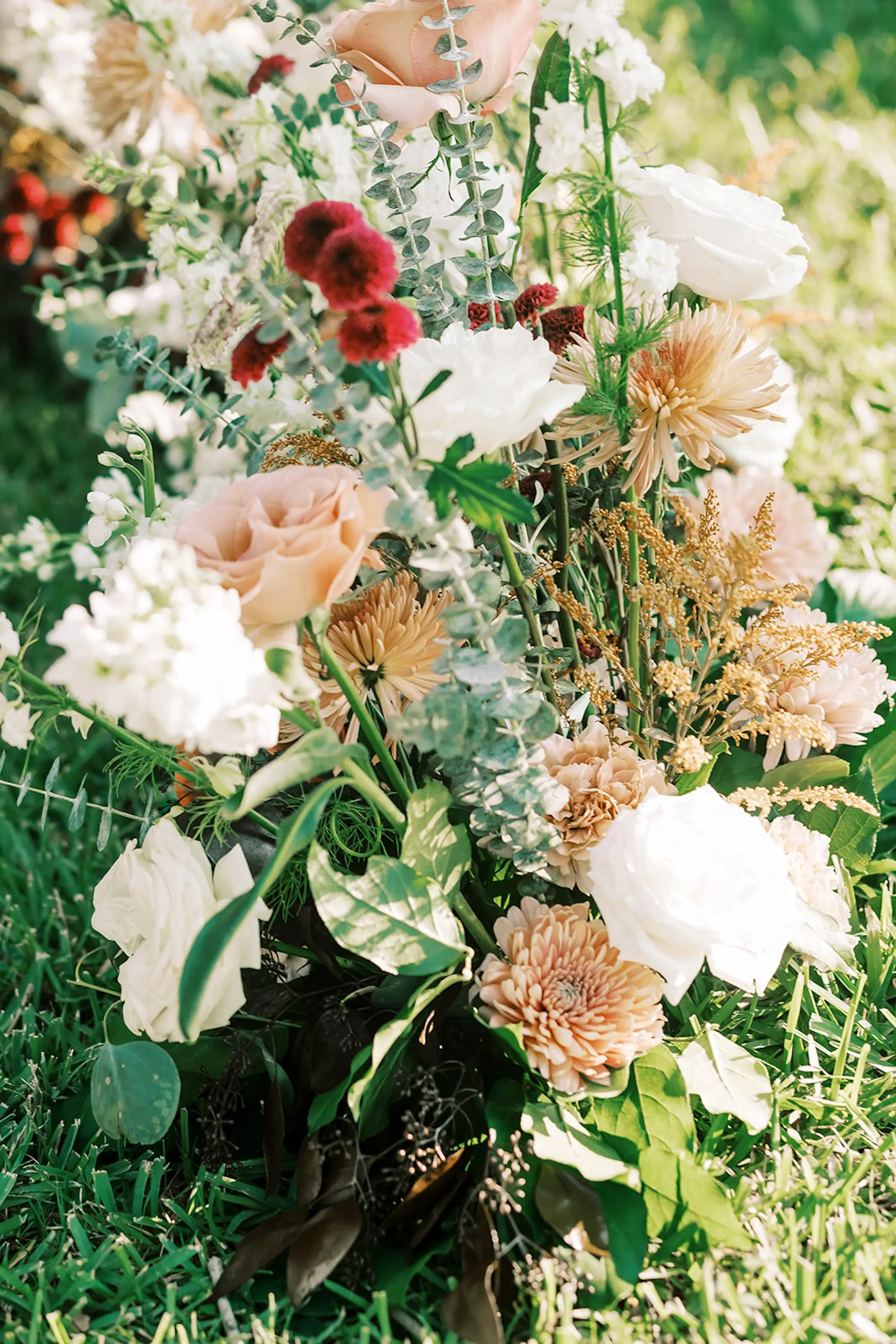 Romantic Neutral Wedding Ceremony Aisle Decor Inspiration | Pink, White, and Red Flowers with Greenery