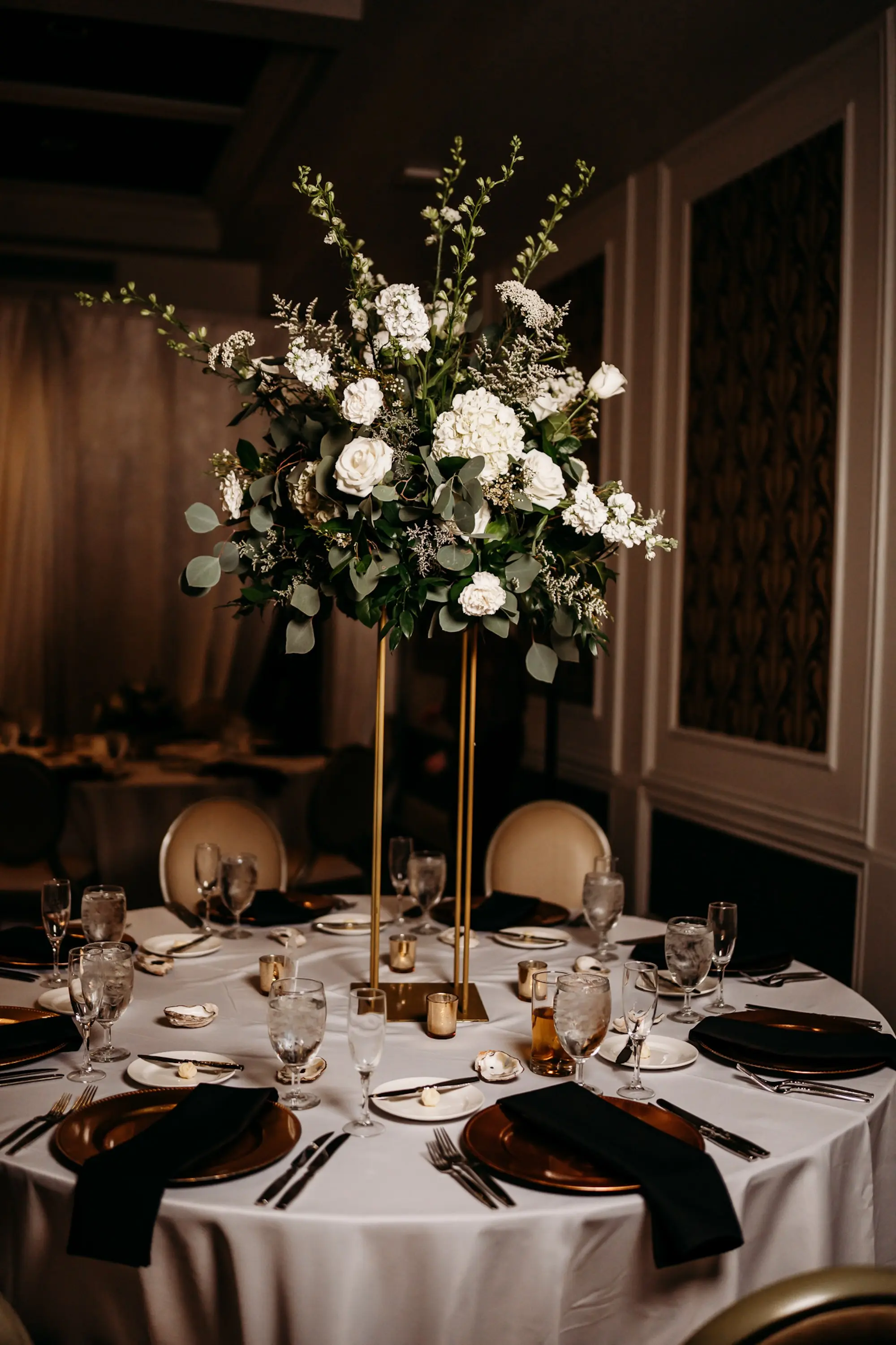 Elegant Green and White Fall Grand Ballroom Wedding Reception | Tall Gold Flower Stand with White Hydrangeas, Roses, and Snapdragons Ideas