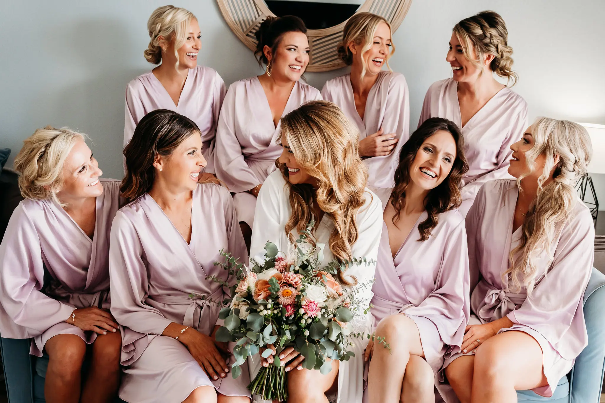 Bride and Bridesmaids Getting Ready Wedding Portrait in Light Pink Blush Robes | Eucalyptus and Soft White and Blush Florals Bridal Bouquet Inspiration | Soft Beach Curls Wedding Hair Ideas | Natural Elegant Wedding Makeup Inspiration | Tampa Bay Wedding Hair and Makeup Artist Adore Bridal Hair and Makeup Tampa Bay Photographer Sabrina Autumn Photography