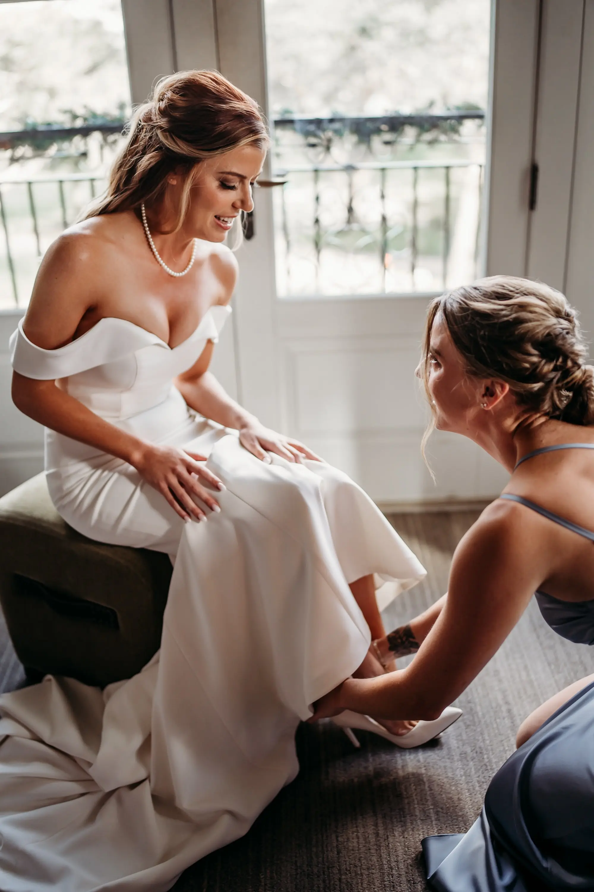 Bride and Bridesmaid Getting Ready Wedding Portrait | Off The Shoulder Fitted Mermaid Madi Lane Bridal Wedding Dress Inspiration