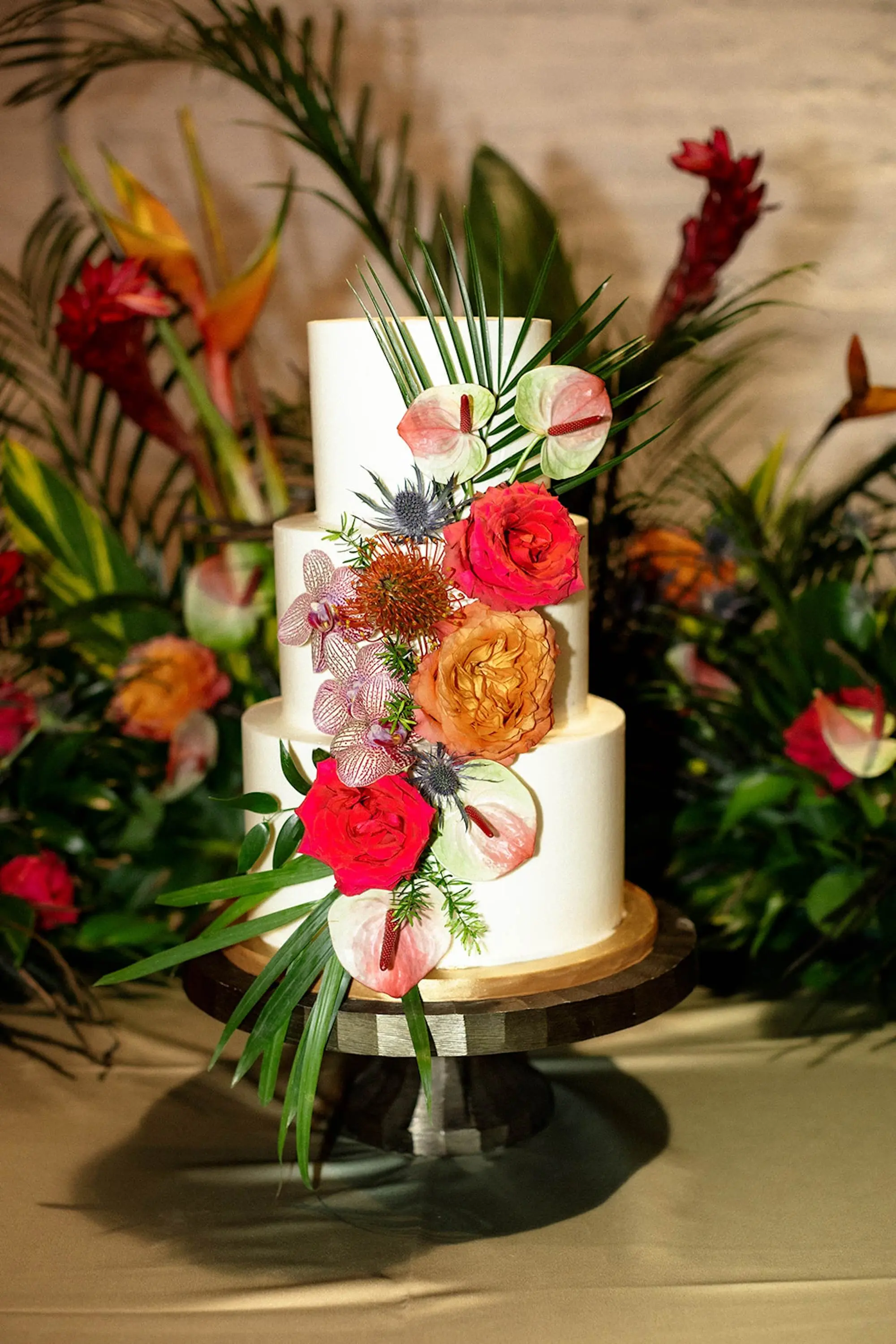 White Round Three-Tiered Wedding Cake with Pink and Orange Flowers Inspiration