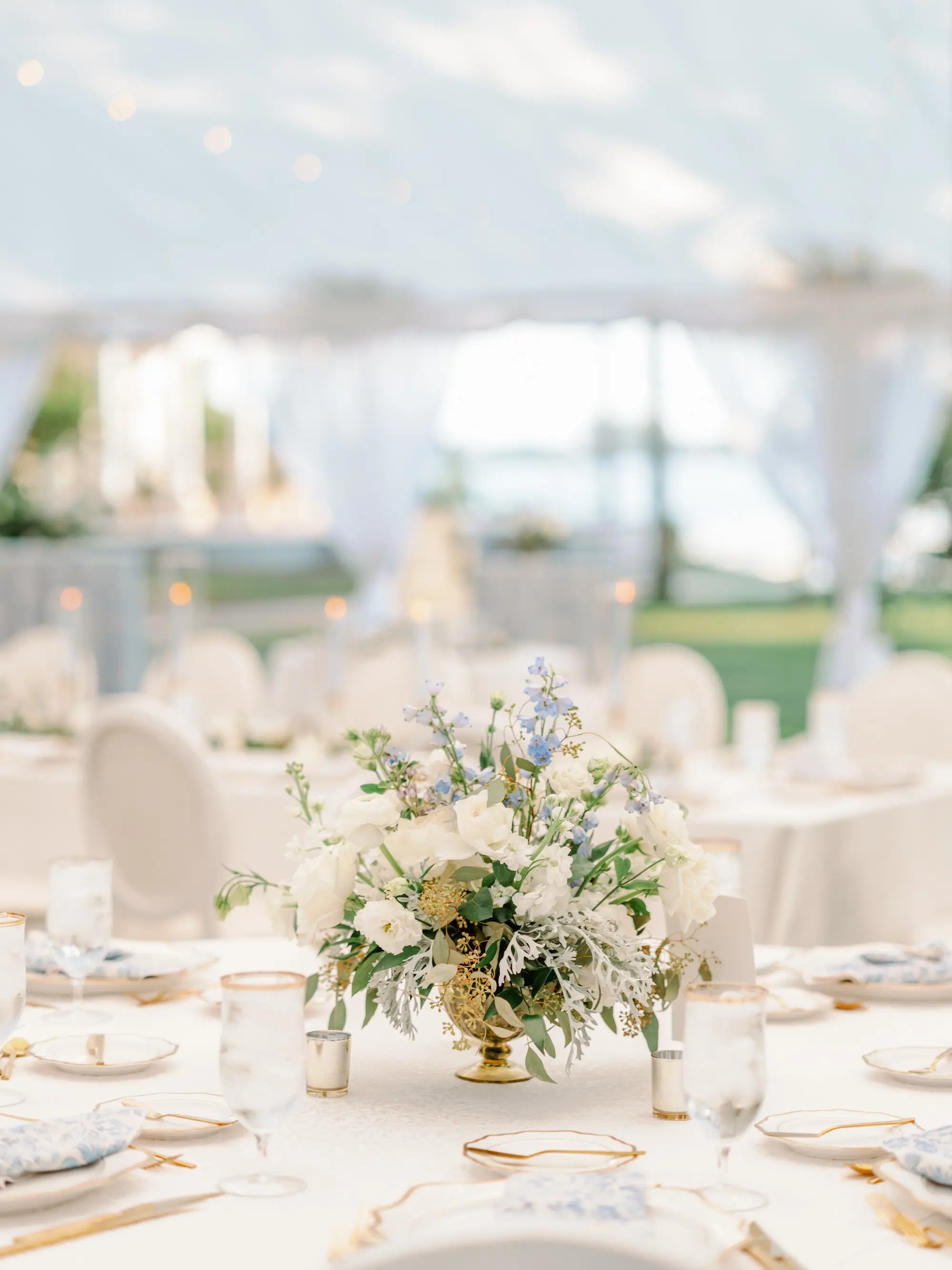 Luxurious Blue Spring Garden Tented Wedding Reception Tabletop Decor Inspiration | Blue and White Flowers, and Greenery | Sarasota Florist Beneva Florist