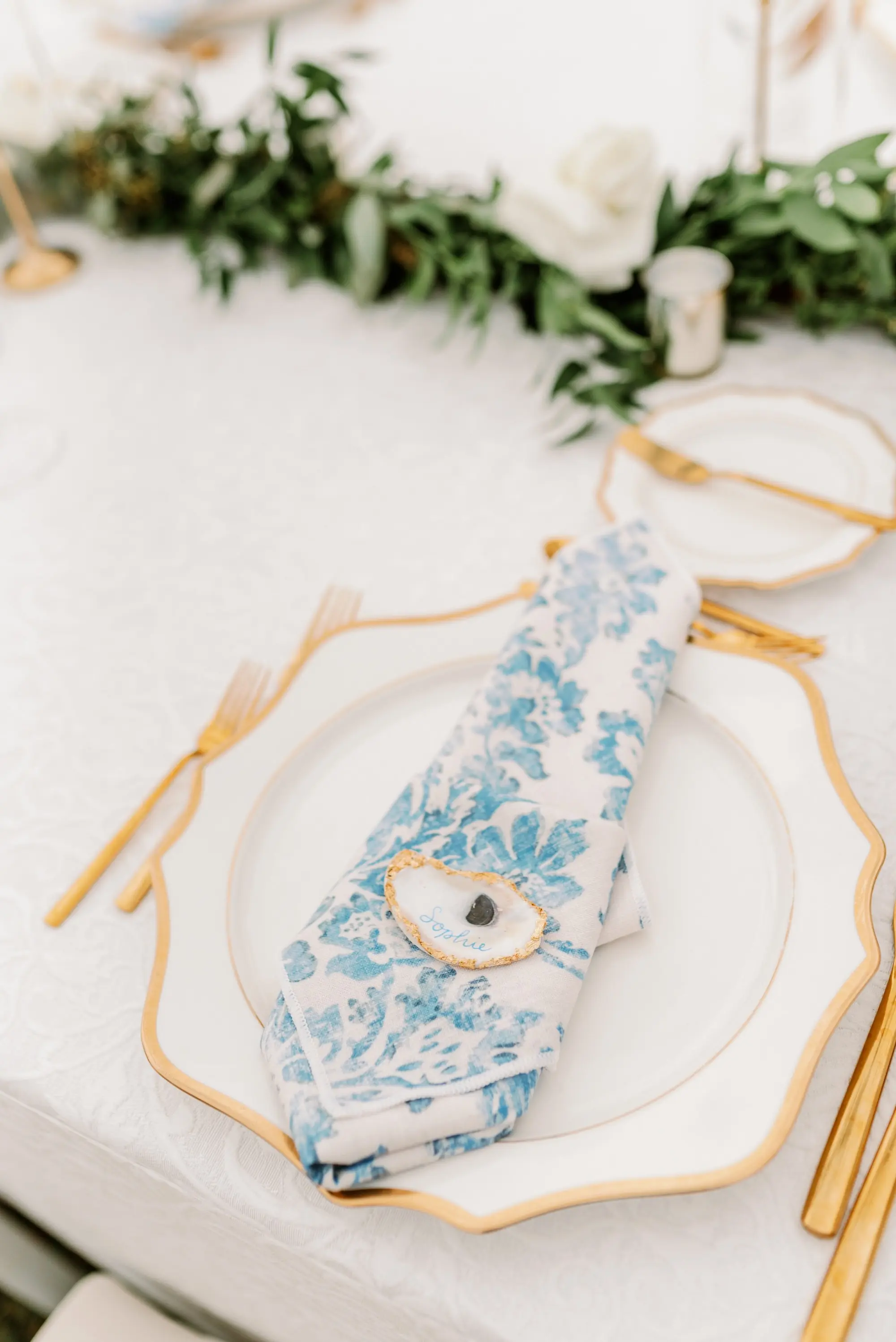 Luxurious Blue and Gold Spring Garden Tented Wedding Reception Place Setting Decor Inspiration