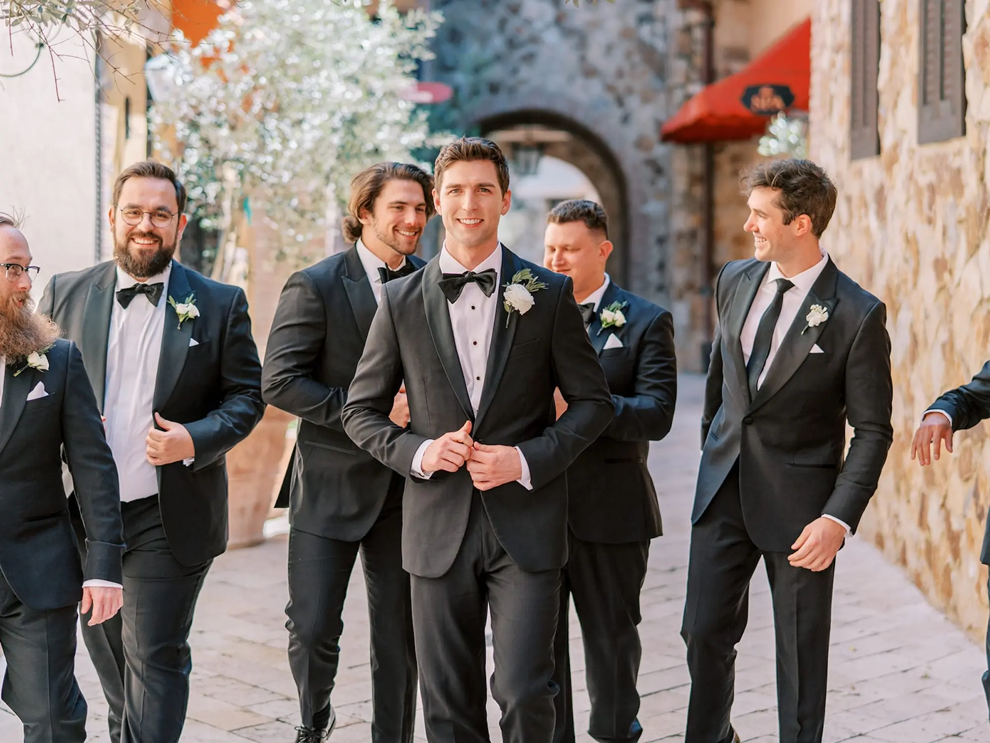 Groom and Groomsmen in Classic Black Tuxedo Wedding Party Attire Ideas