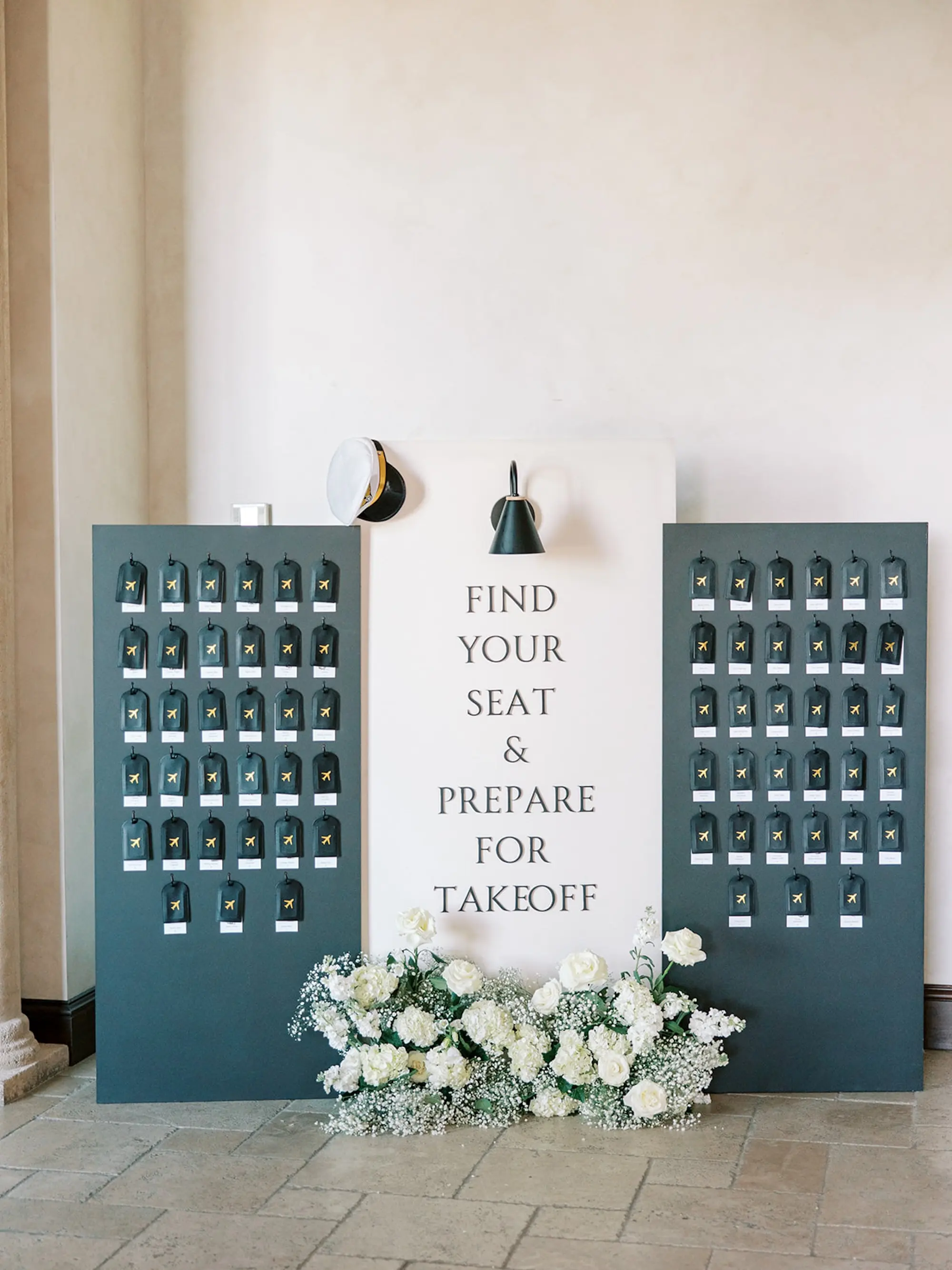 Luggage Tag Wedding Reception Seating Chart Inspiration | White Roses and Baby's Breath Floral Arrangement Wedding Reception Decor Ideas | Spring Florida Wedding Ideas