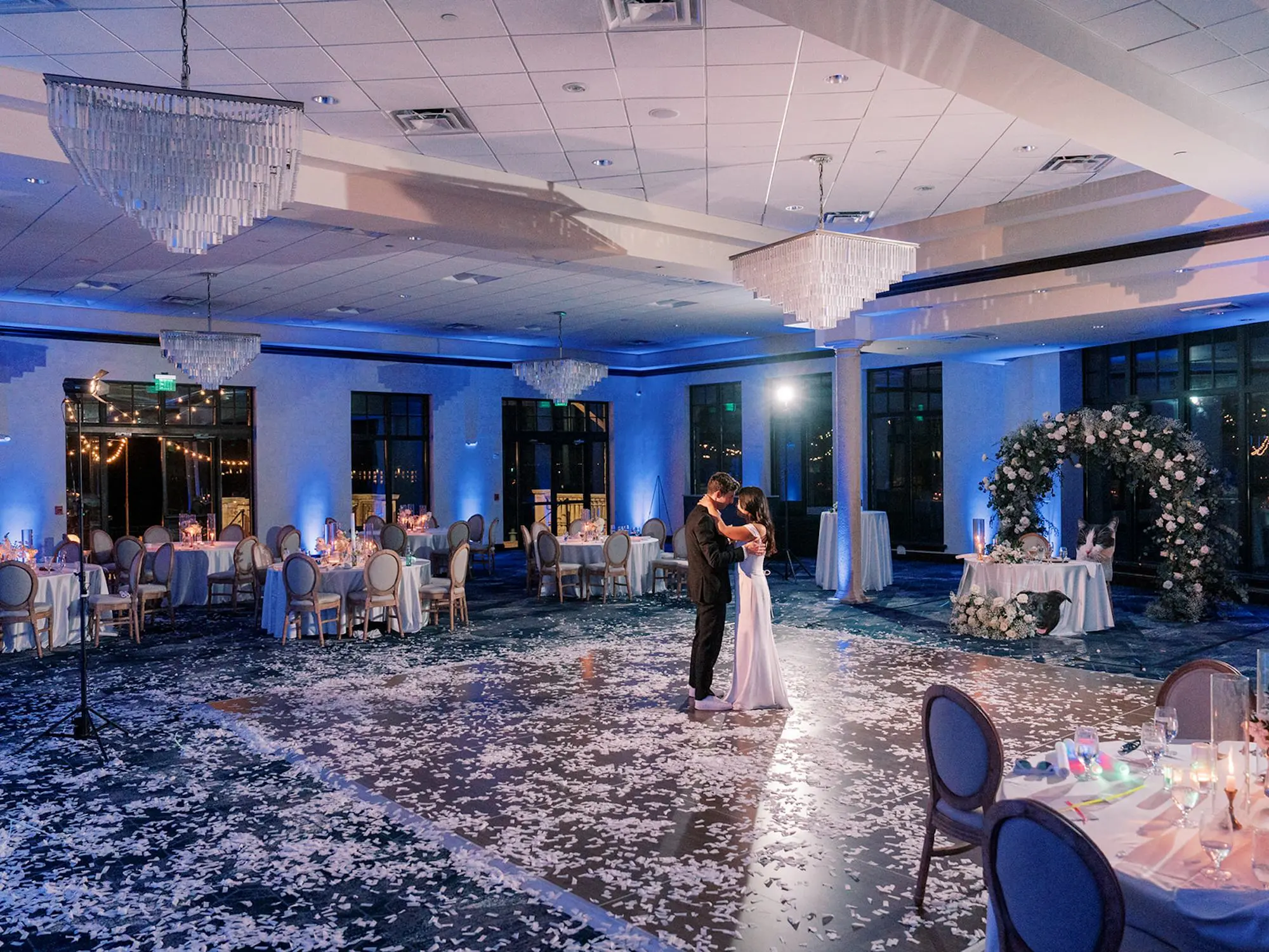 Bride and Groom First Dance Wedding Portrait | Luxurious Ballroom Wedding Reception | Modern Gold and White King Louis XVI Chairs | Romantic Candlelight Centerpieces Ideas | Event Venue Bella Collina