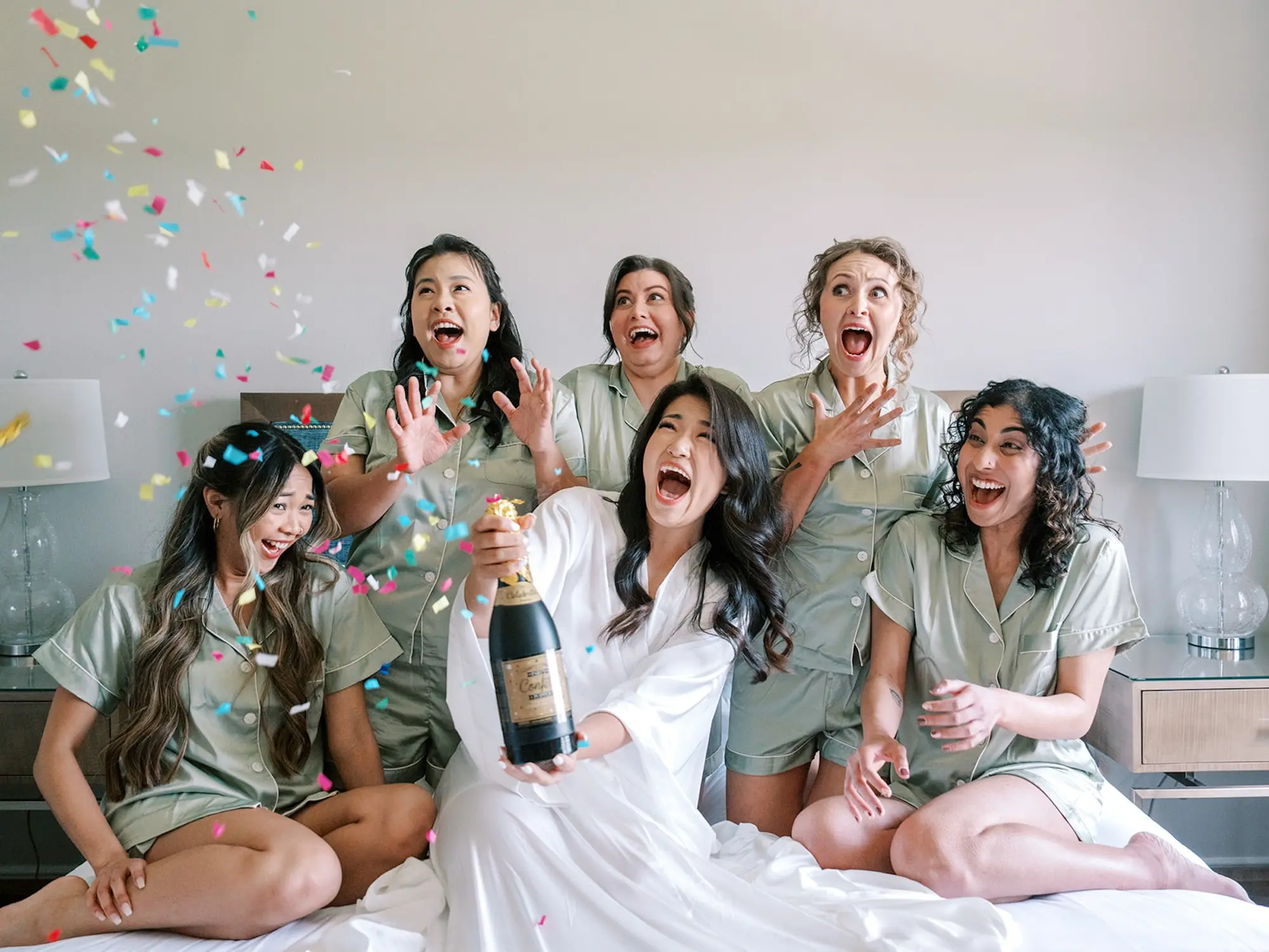 Bride and Bridesmaids Getting Ready Wedding Portrait | Matching Sage Satin Pajama Ideas