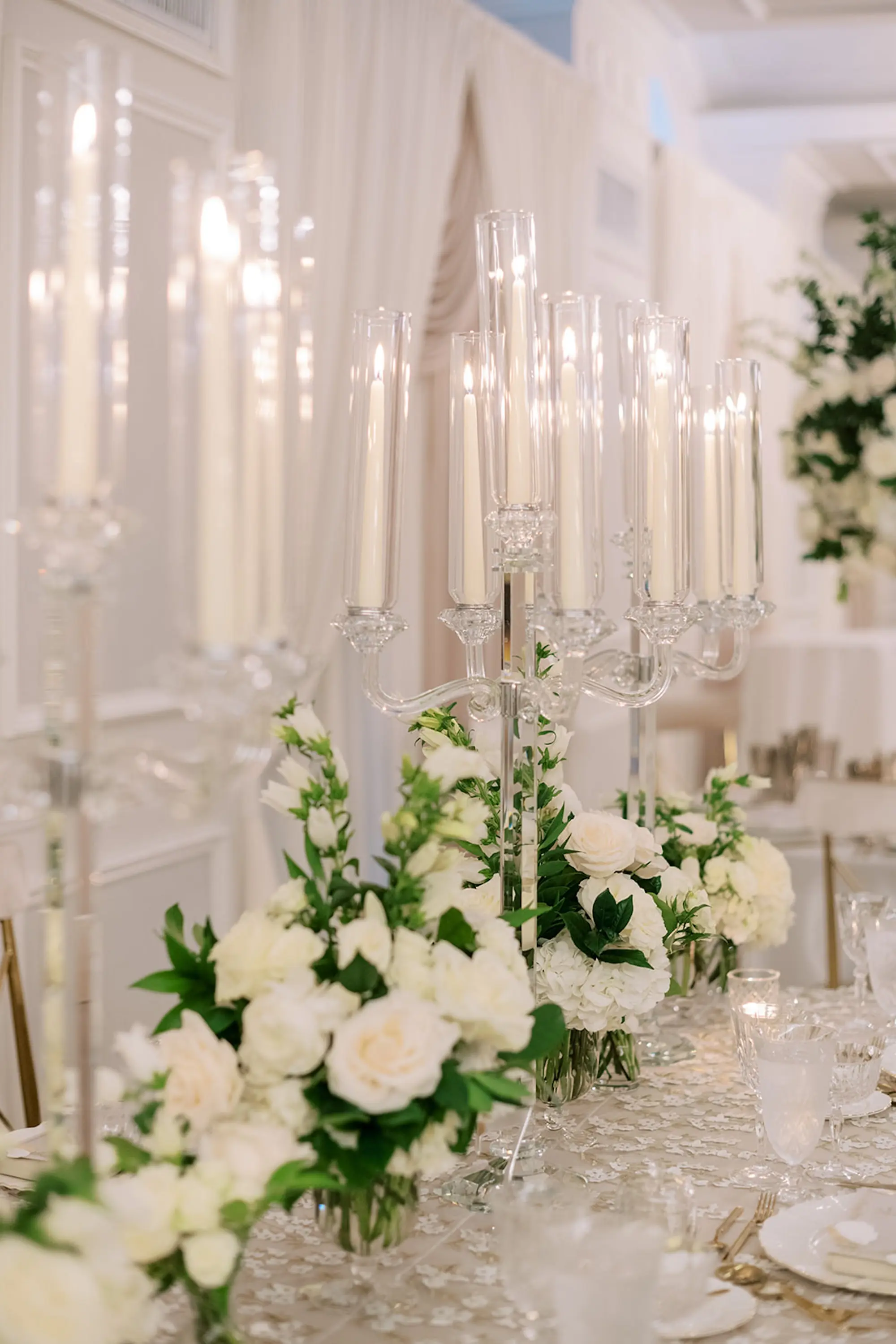 Luxurious Ivory and Gold Wedding Reception Decor Inspiration | Romantic Crystal Candelabra Tablescape Decor Ideas | Classic White Roses Centerpiece Inspiration | Tampa Bay Event Planner Parties A La Carte