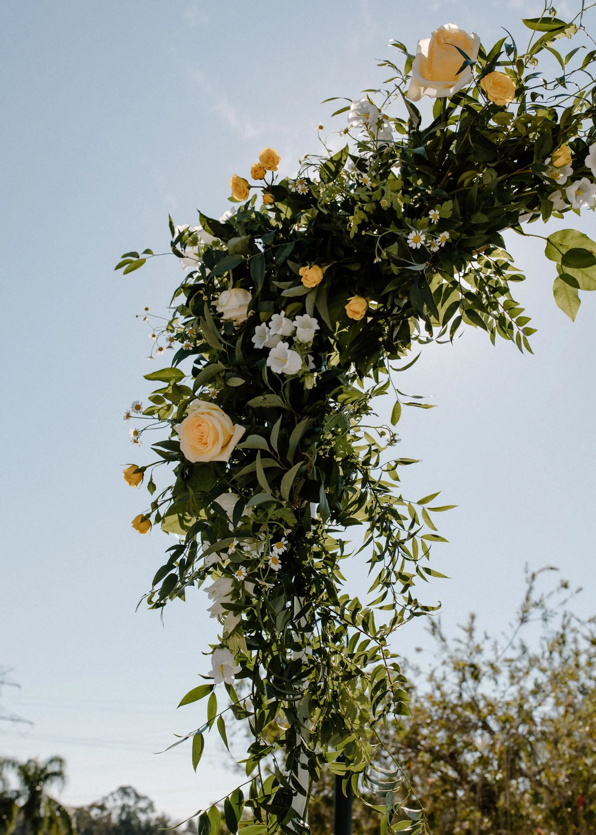 Square Wedding Ceremony Arch with Yellow Roses and White Flowers in Lush Greenery Decor Inspiration | Outdoor Wedding Ceremony Ideas | Fall Florida Outdoor Weddings Inspiration