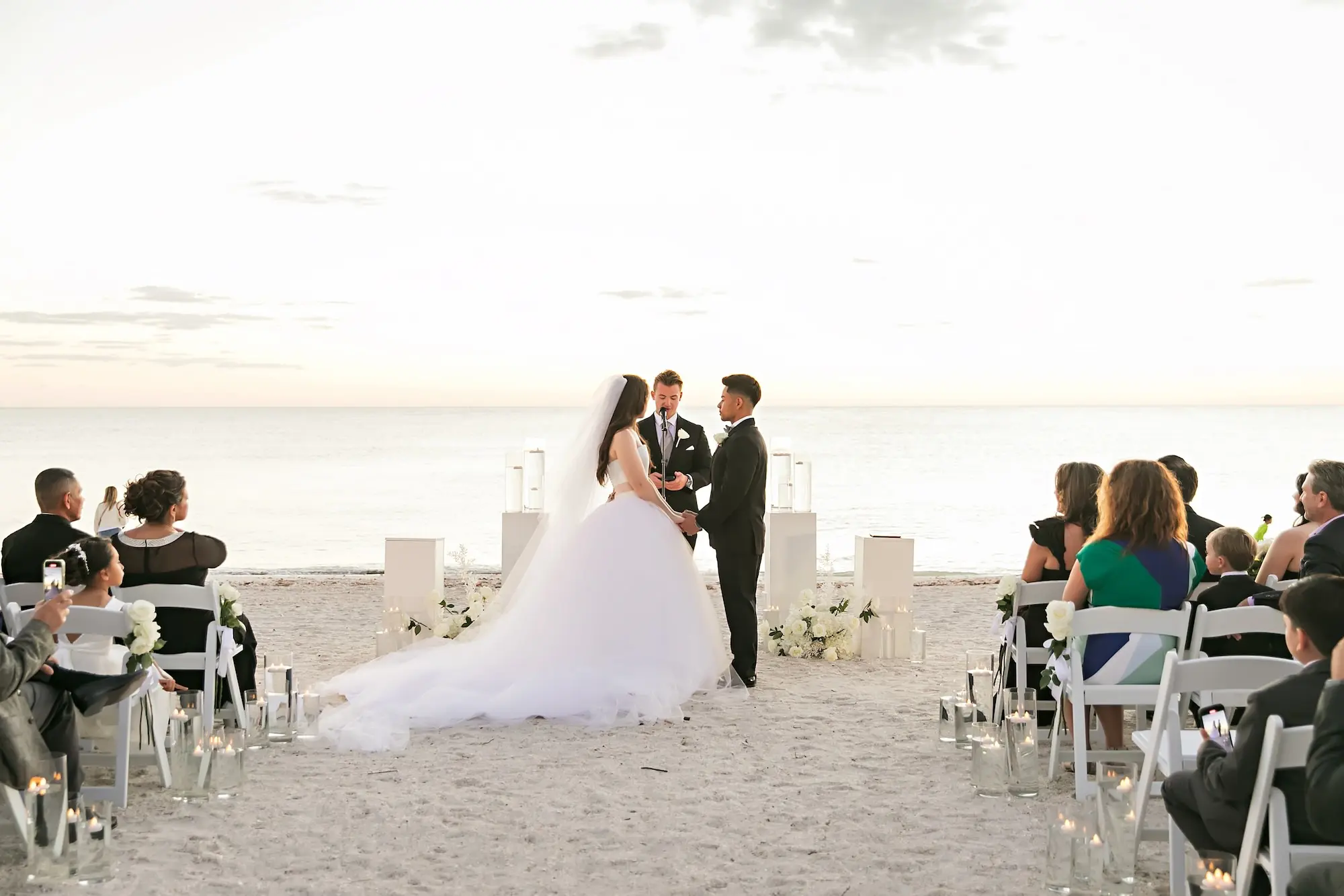 Romantic White Beach Wedding Ceremony Decor Inspiration | Tampa Bay Photographer Limelight Photography | Sarasota Event Venue Lido Beach Resort