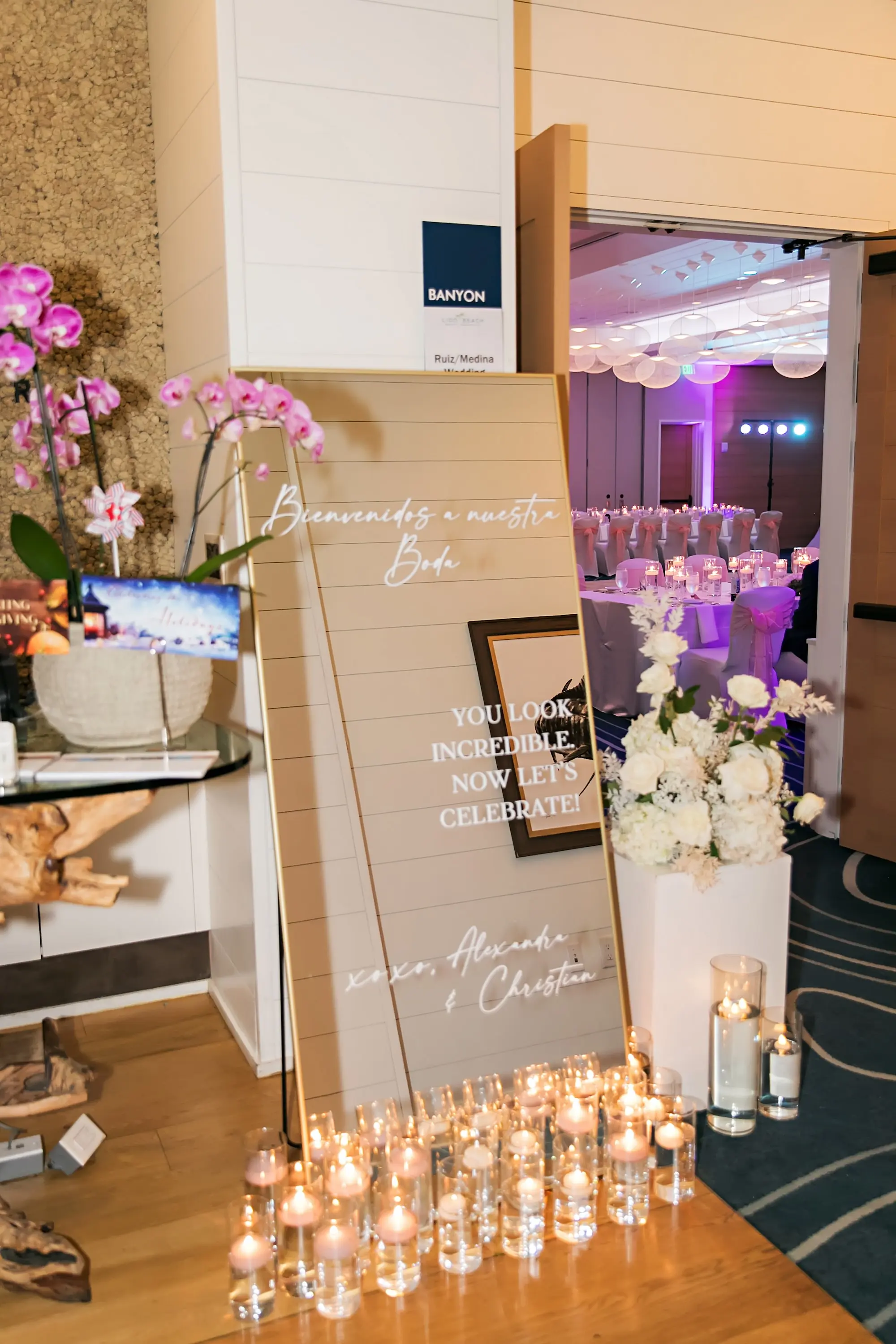 Modern Mirror with Gold Frame Welcome Wedding Reception Sign Display Inspiration | Floating Tea Candles Decor Ideas