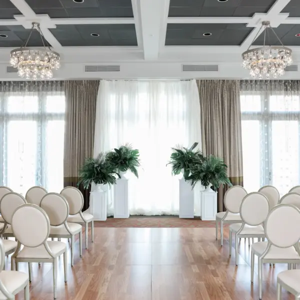 10Elegant Green White and Gold Ballroom St Pete Wedding Venue The Birchwood - Tropical Green and White Downtown St. Pete Wedding | The Birchwood Tropical Palms Wedding Ceremony Altar Decor Inspiration | Tan and White King Louis IX Wedding Ceremony Chairs Ideas | Intimate Micro Wedding Inspiration | Boutique Hotel Venue The Birchwood | Planner Coastal Coordinating