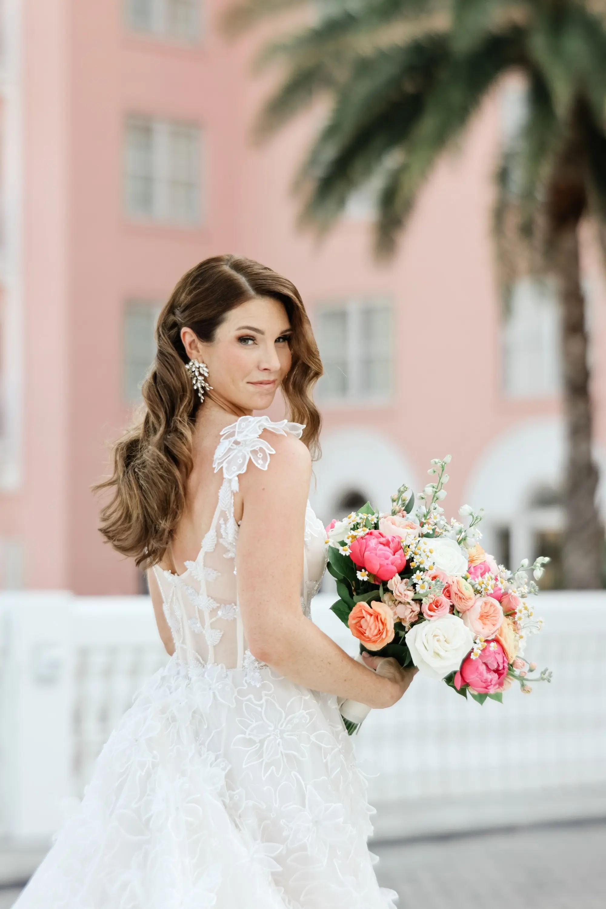 Bride Wedding Portrait | White, Pink, Coral, Peach, Blush Roses, Peonies, Carnation and Wisteria Flower Arrangement Wedding Ceremony Decor Inspiration | Lace and Tulle Galia Lahav Wedding Gown with Fitted Bodice and Full Layered, Ruffled Skirt and Train Ideas | Soft, Curls Bridal Hair Inspiration | Soft Beach Curls Bridal Hair Ideas | Ybor Hair and Makeup Artist Adore Bridal Hair and Makeup | St Pete Photographer Lifelong Photography Studio