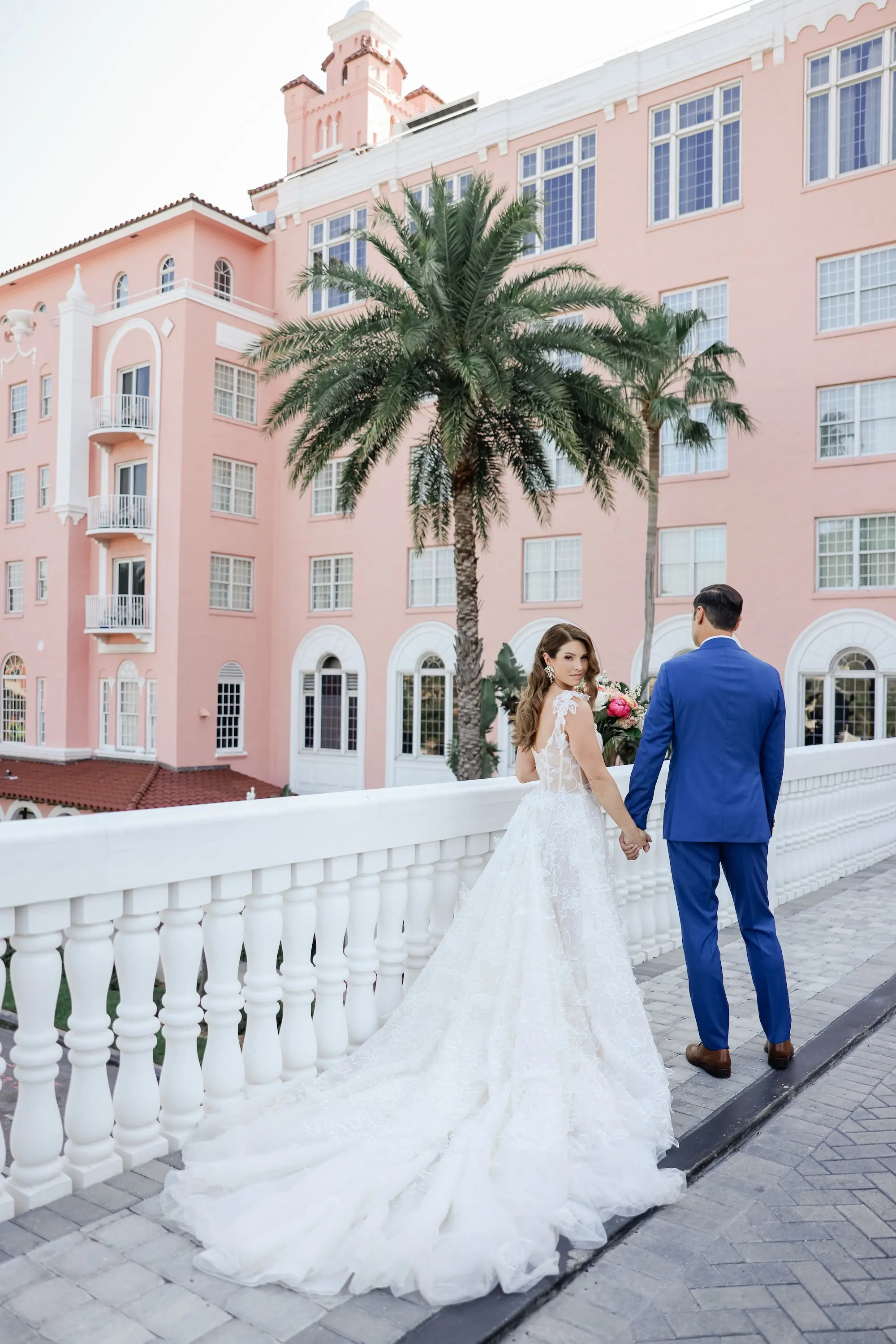 Lace and Tulle Galia Lahav Wedding Gown with Fitted Bodice and Full Layered, Ruffled Skirt and Train Inspiration | Groom Blue Suit Ideas | Soft Beach Curls Bridal Hair Inspiration | Historic Pink Palace St Pete Beach Wedding Venue Don CeSar | St Pete Beach Resort Wedding Venue | St Pete Photographer Lifelong Photography Studio | Ybor Hair and Makeup Artist Adore Bridal Hair and Makeup