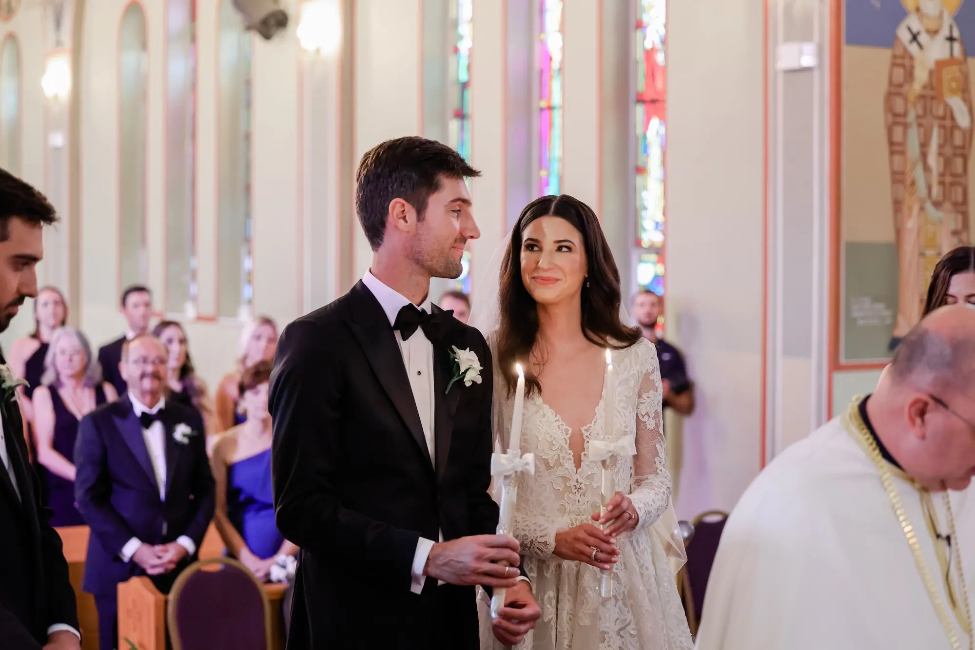 Bride and Groom Unity Candle Traditional Greek Orthodox Wedding Ceremony Inspiration | Wedding Ceremony Venue St. John Baptist Greek Orthodox Church | Tampa Bay Wedding Photographer Lifelong Photography Studio