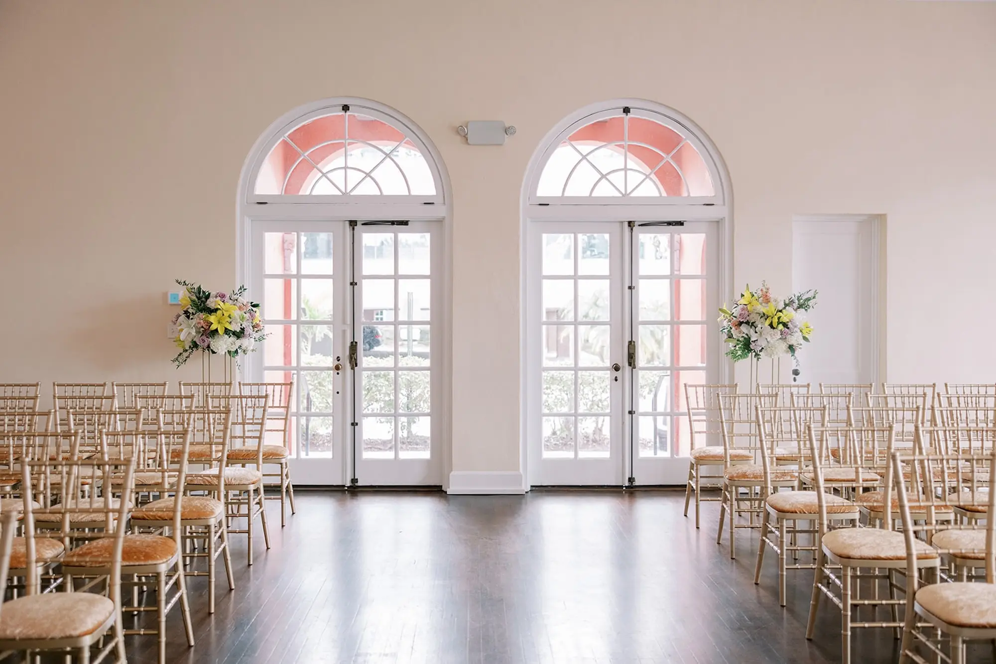 Indoor Historical Venue Wedding Ceremony Ideas | Gold Chiavari Chairs with Gold Velvet Cushions Ceremony Decor Ideas | Venue The Orlo