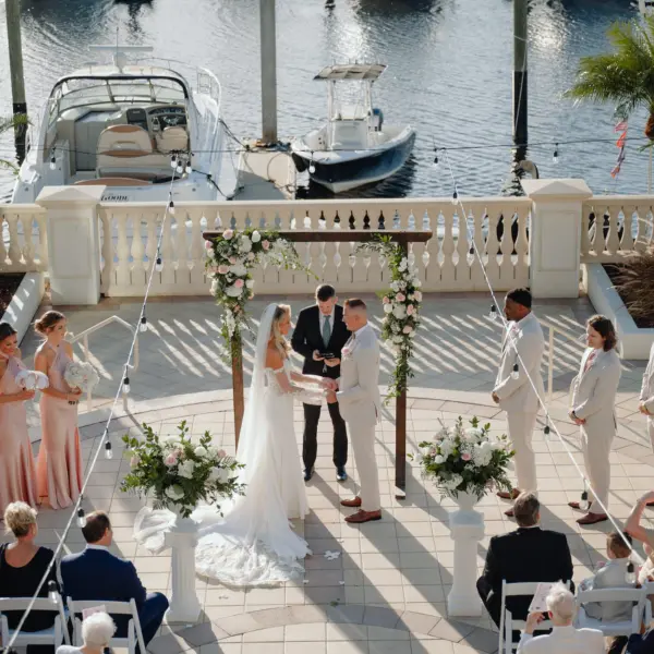 Bride and Groom Wedding Ceremony Vow Exchange Wedding Portrait | Tampa Bay Florida Waterfront Wedding Venue Westshore Yacht Club | Florida Photographer and Videographer J&S Media Wedding Films & Photo