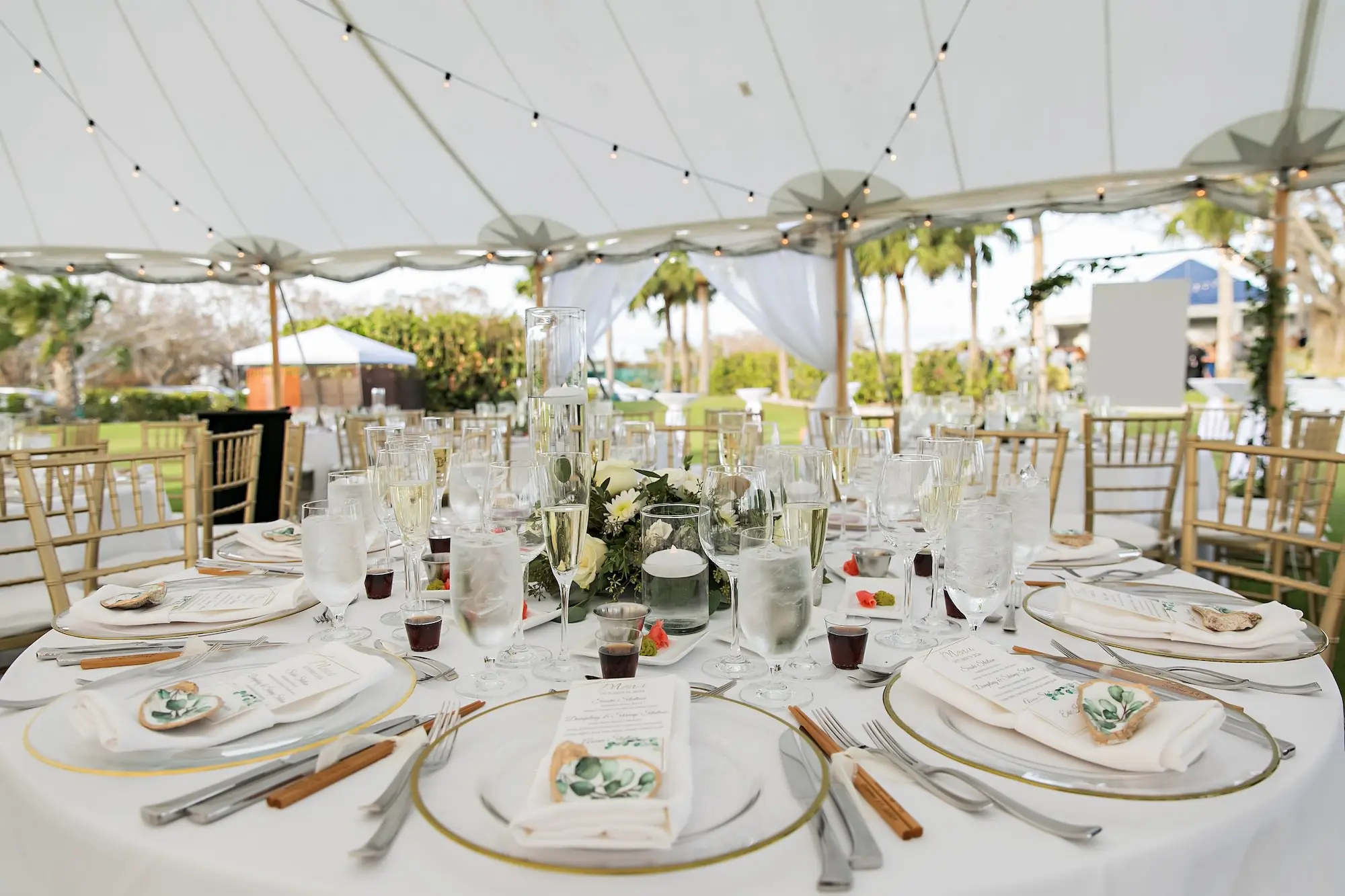 Elegant White and Sage Green Tented Sarasota Wedding Reception Tablescape Decor Ideas