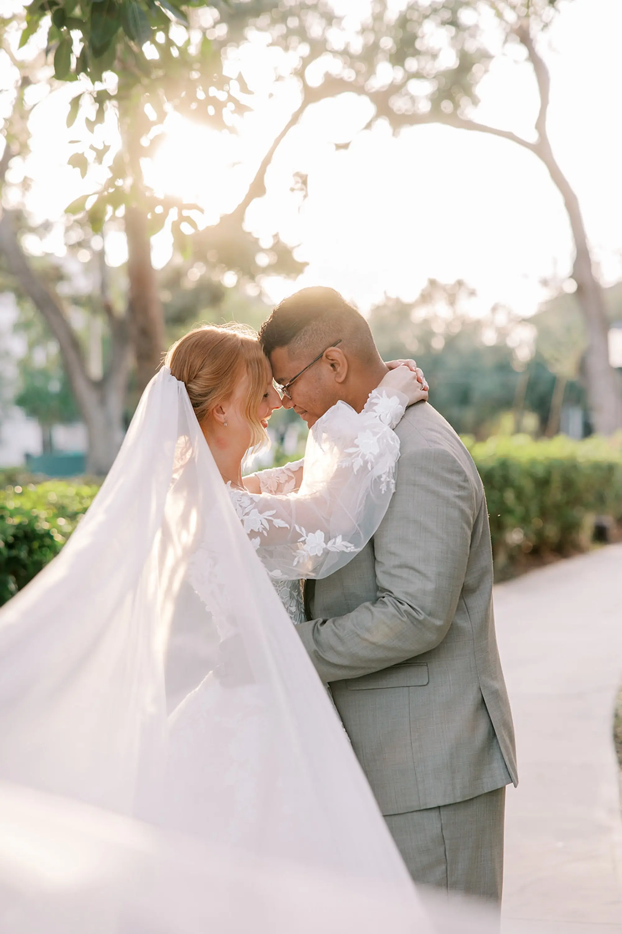 Bride and Groom Outdoor Golden Hour Fall Wedding Portrait | Cathedral Length Chiffon Veil Ideas | Grooms Gray Suit Inspiration | South Tampa Photographer Eddy Almaguer Photography