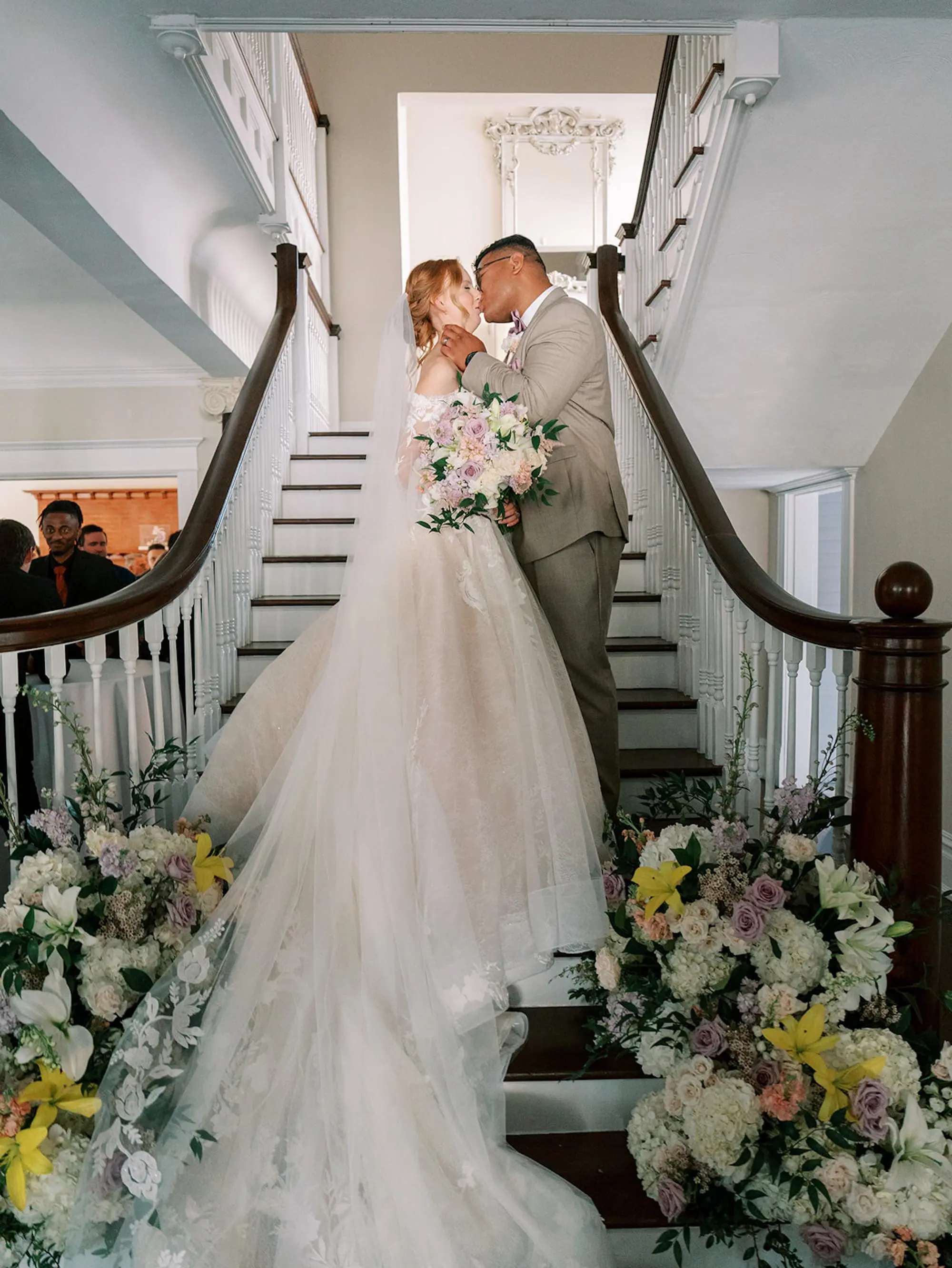 31Purple and Yellow Disney Princess Wedding Inspiration Tampa Venue The Orlo jpg - “Best Of” 2025: Wedding Portraits Bride and Groom Staircase Wedding Portrait | Cathedral Length Chiffon Veil Inspiration | Soft, Pastel Blush, Lavender, Yellow, White Floral Arrangements of Roses, Hydrangeas, Carnations Wedding Decor Ideas | South Tampa Photographer Eddy Almaguer Photography | Venue The Orlo