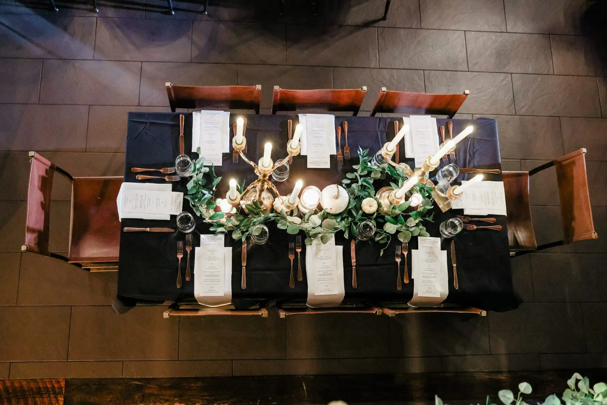 Dark and Moody Black and Gold Fall Halloween Wedding Reception Tablescape Place Setting Decor Inspiration