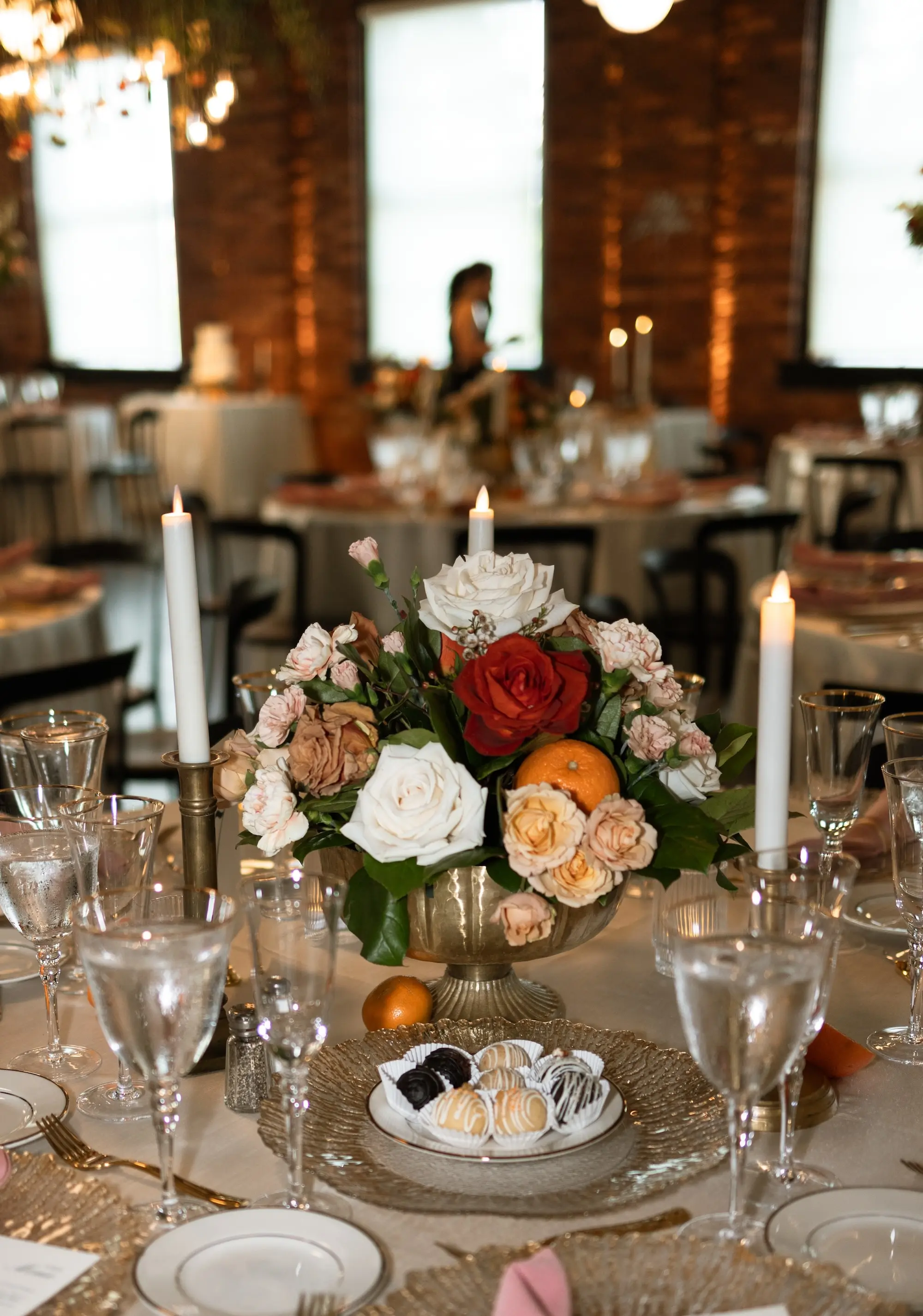 Vintage Old Florida Wedding Reception Centerpiece Decor Inspiration | White, Pink, Orange, and Red Flowers with Greenery