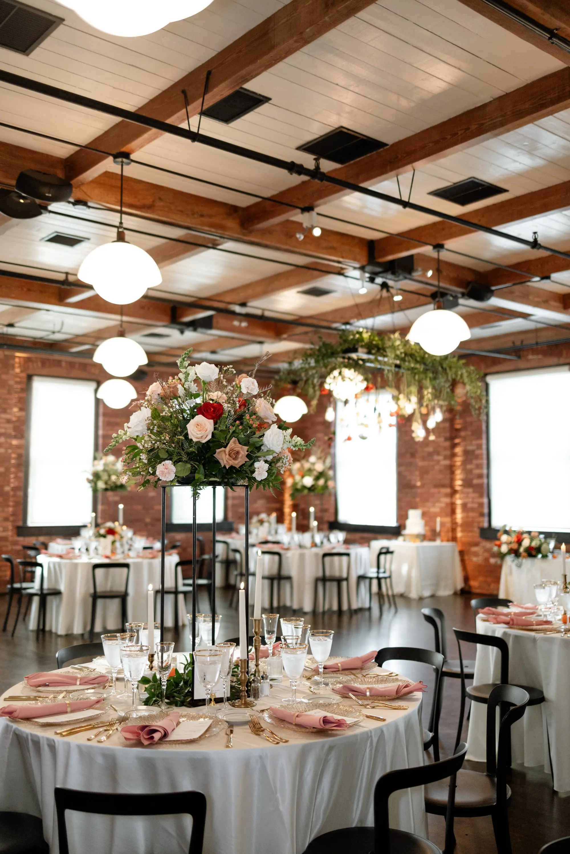 Vintage Old Florida Wedding Reception Tablescape Place Setting Centerpiece Decor Ideas | White, Pink, and Red Flowers with Greenery | Ybor Event Venue JC Newman Cigar Company