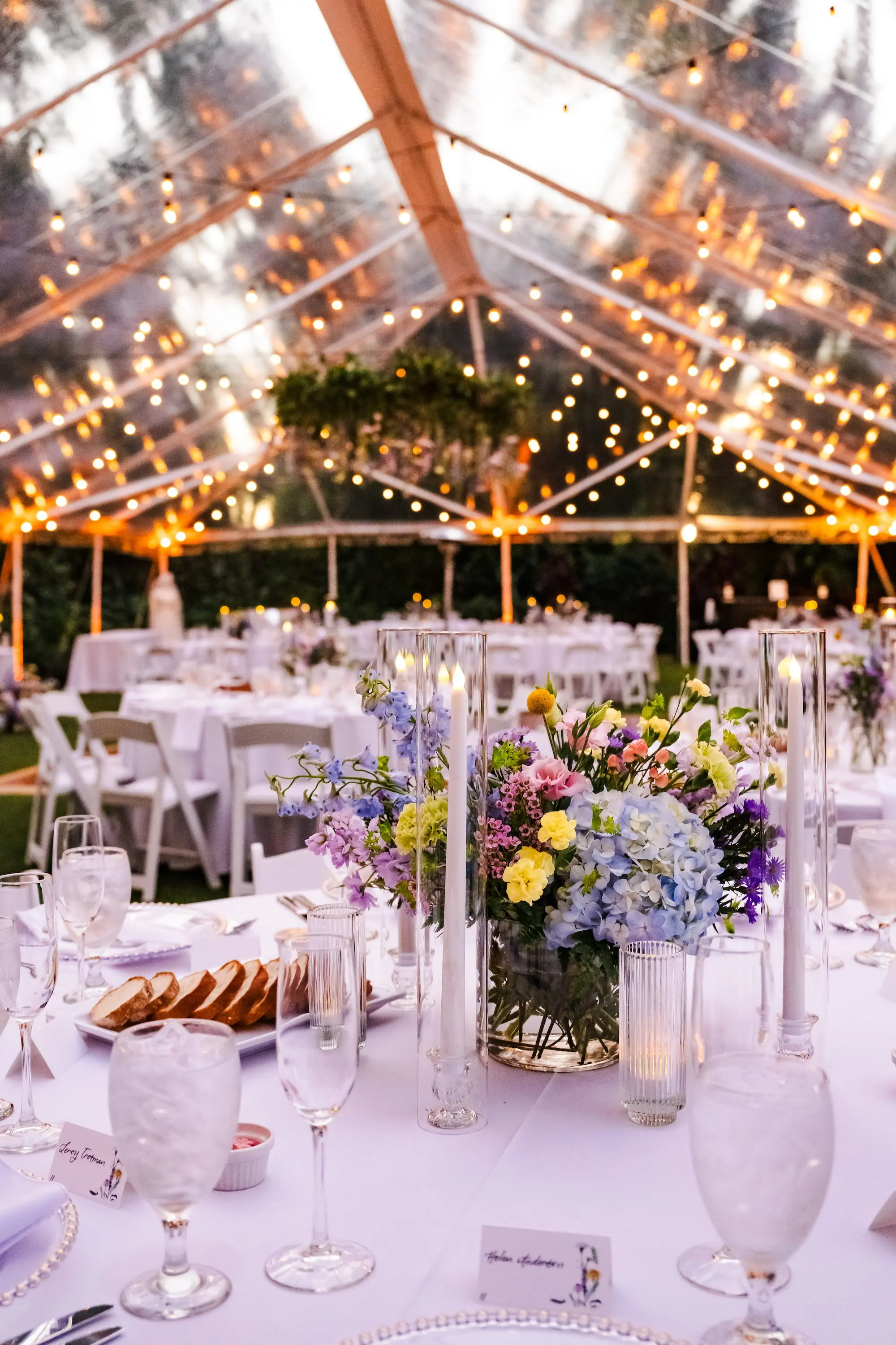 Enchanted Garden Wedding Reception Tabletop Decor Ideas | Pink, Blue, Yellow, and Purple Flower Centerpiece Inspiration | St Pete Event Venue Sunken Gardens