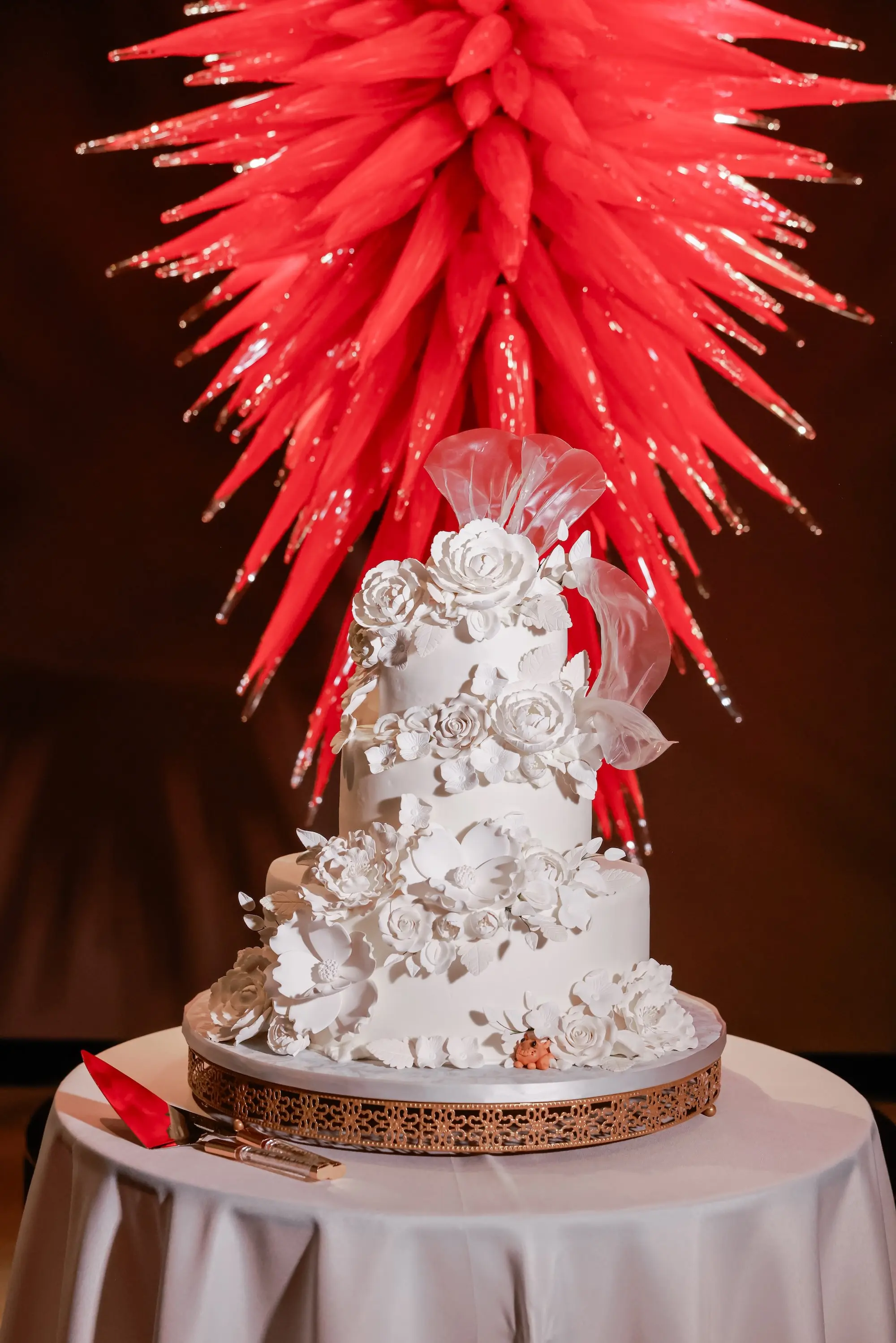 Three Tier Monochromatic White Wedding Cake with White Floral Decor Inspiration