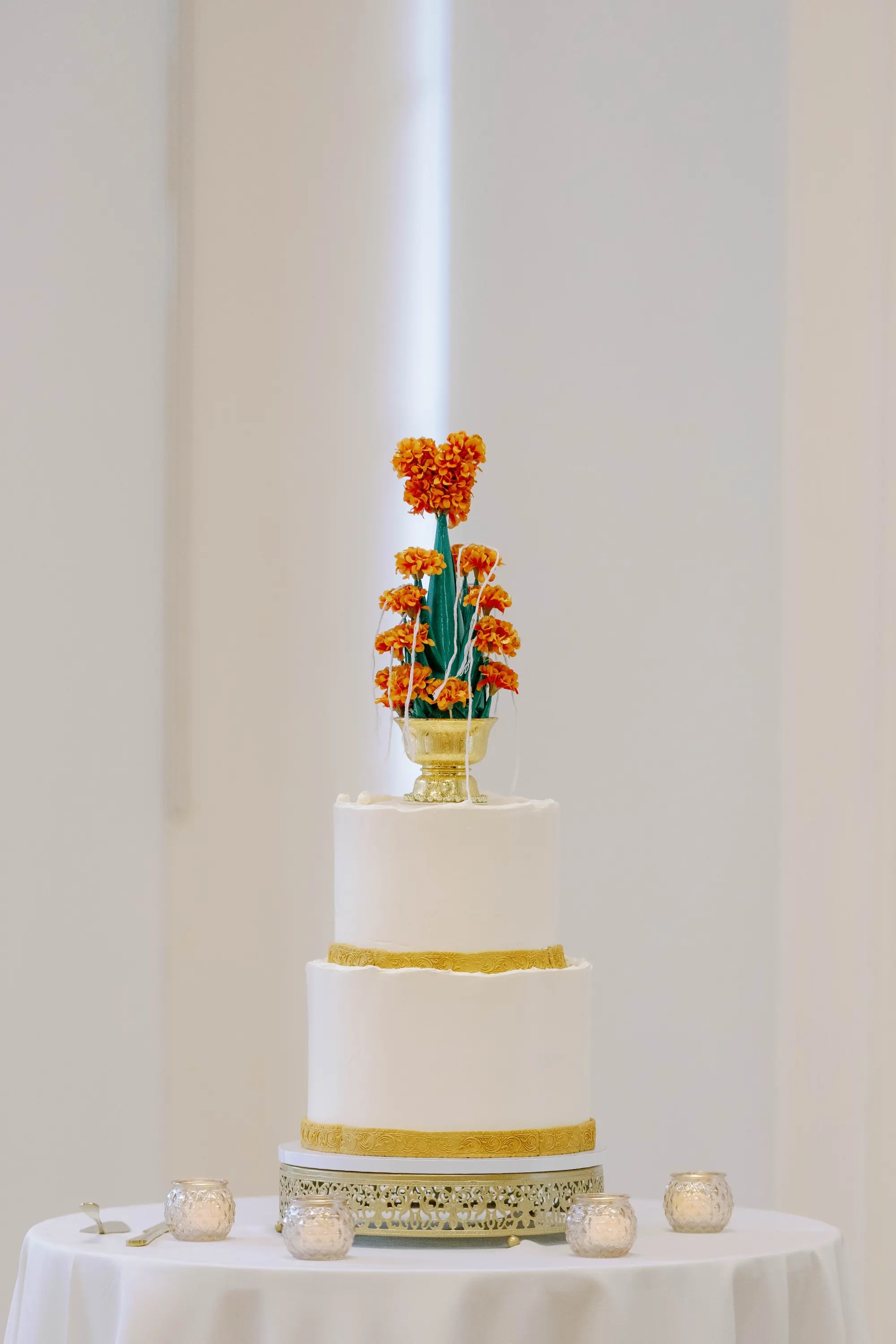 Two-Tiered Round Lao Inspired Wedding Cake Inspiration