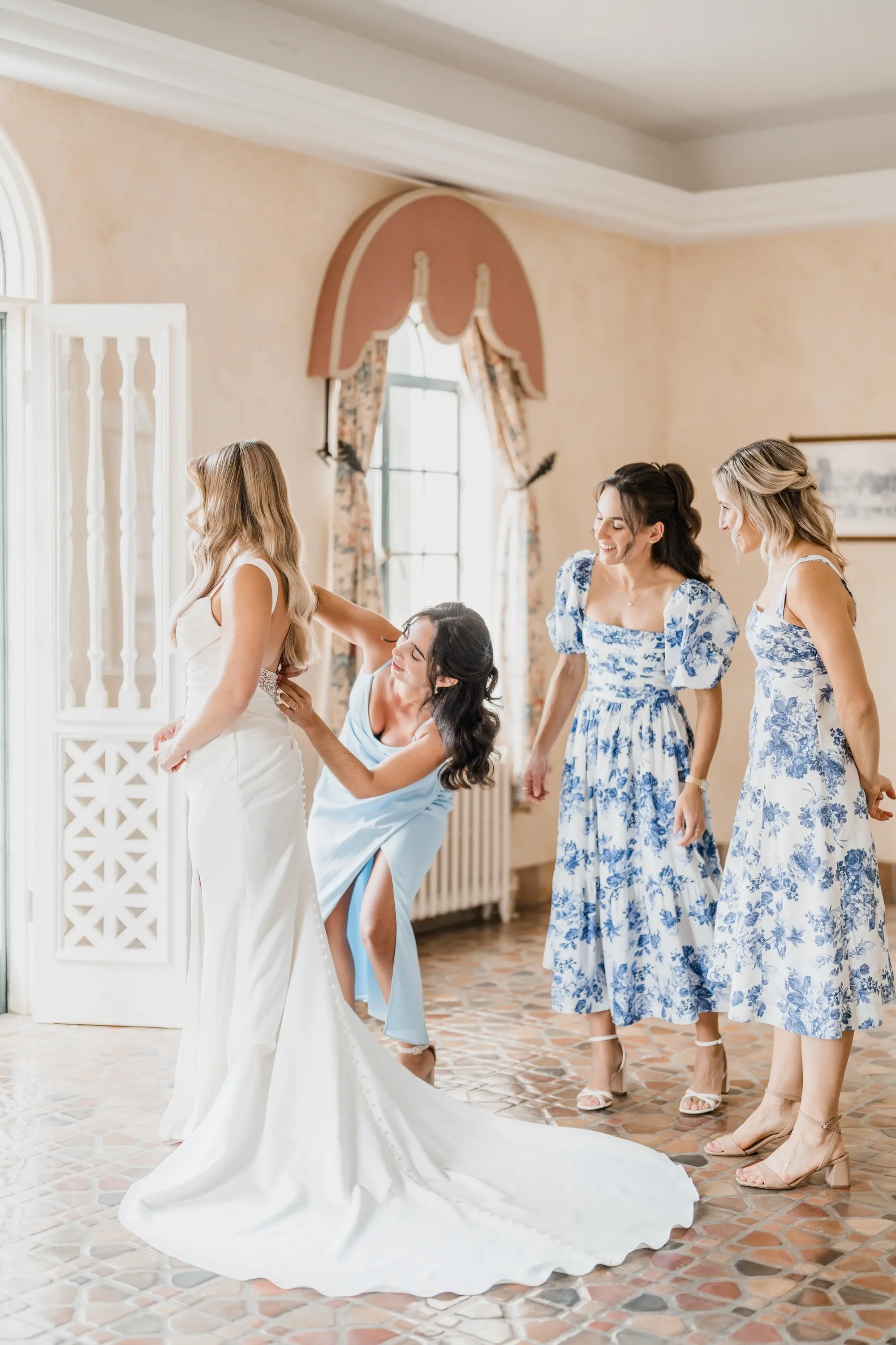 Bride and Bridesmaids Getting Ready Wedding Portrait | Mismatched Blue Floral Dress Ideas