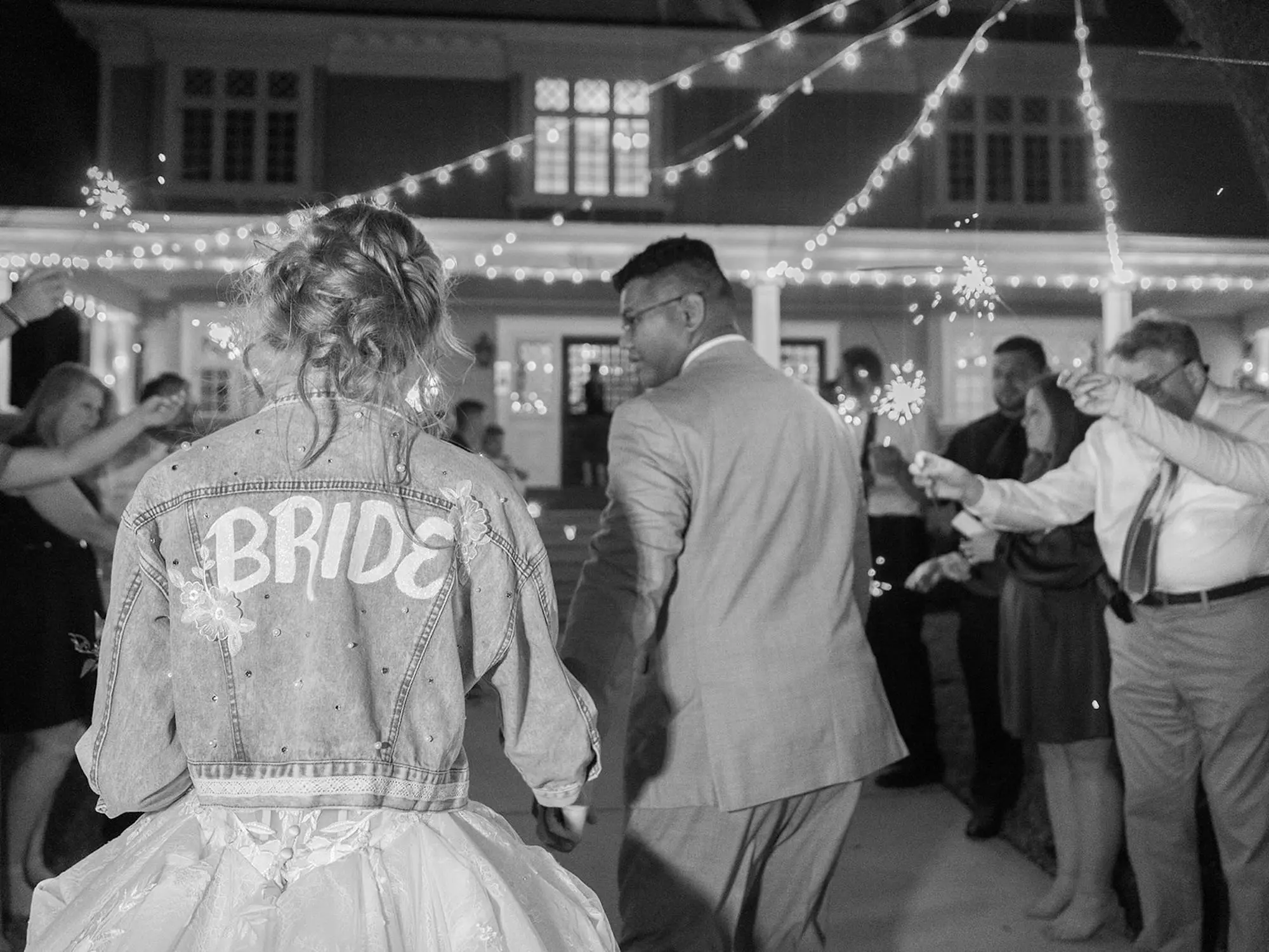 Black and White Bride and Groom Sparkler Wedding Reception Exit Portrait | Custom Bride Bedazzled Jean Jacket Ideas | South Tampa Photographer Eddy Almaguer Photography