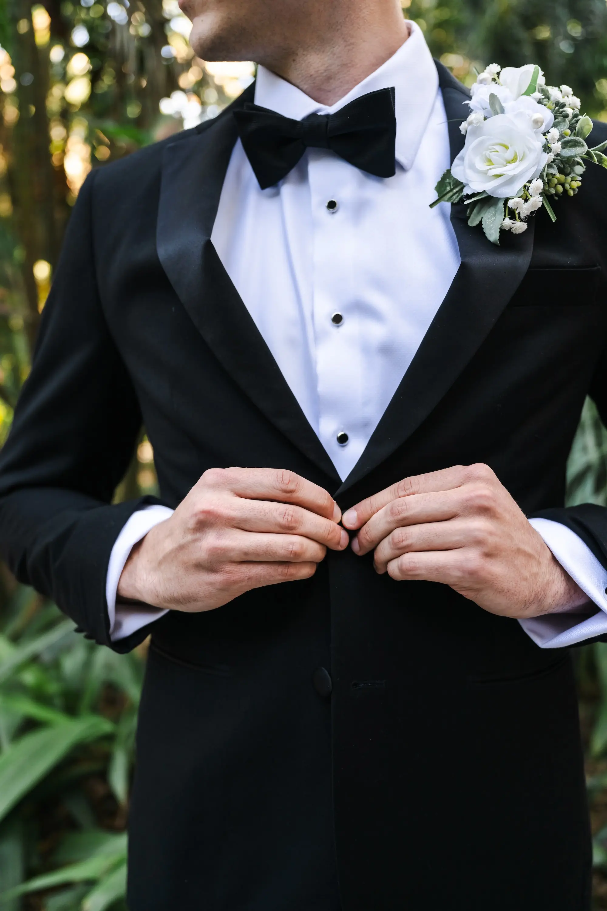 Groom in Black Tuxedo and Bowtie Wedding Attire Inspiration