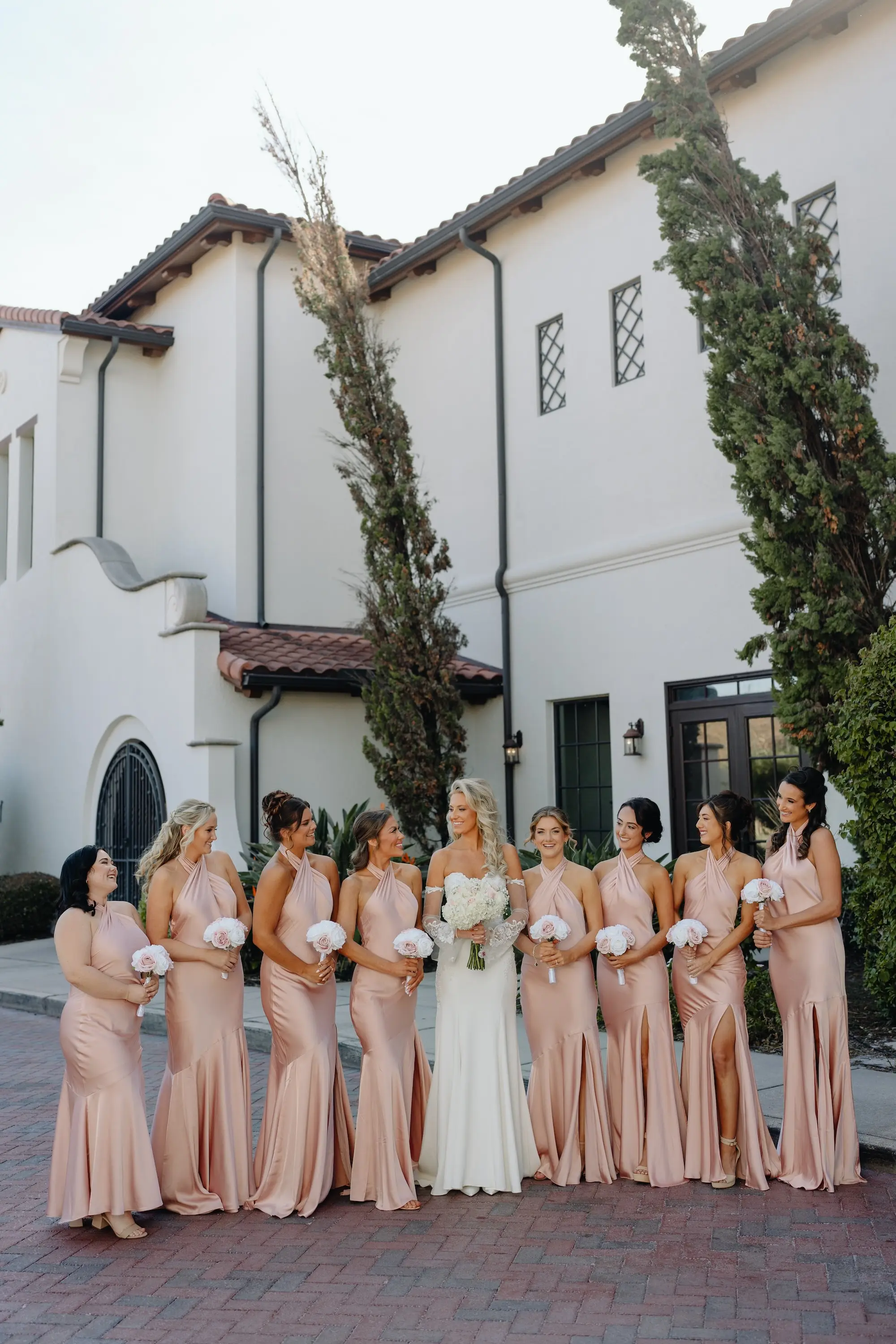 Bride and Bridesmaid Wedding Portrait | Rose Gold Satin Bridesmaid Dresses Inspiration | Traditional White Roses Bridal Bouquet Ideas | Ybor Hair and Makeup Artist Adore Bridal Hair and Makeup | Florida Photographer and Videographer J&S Media Wedding Films & Photo