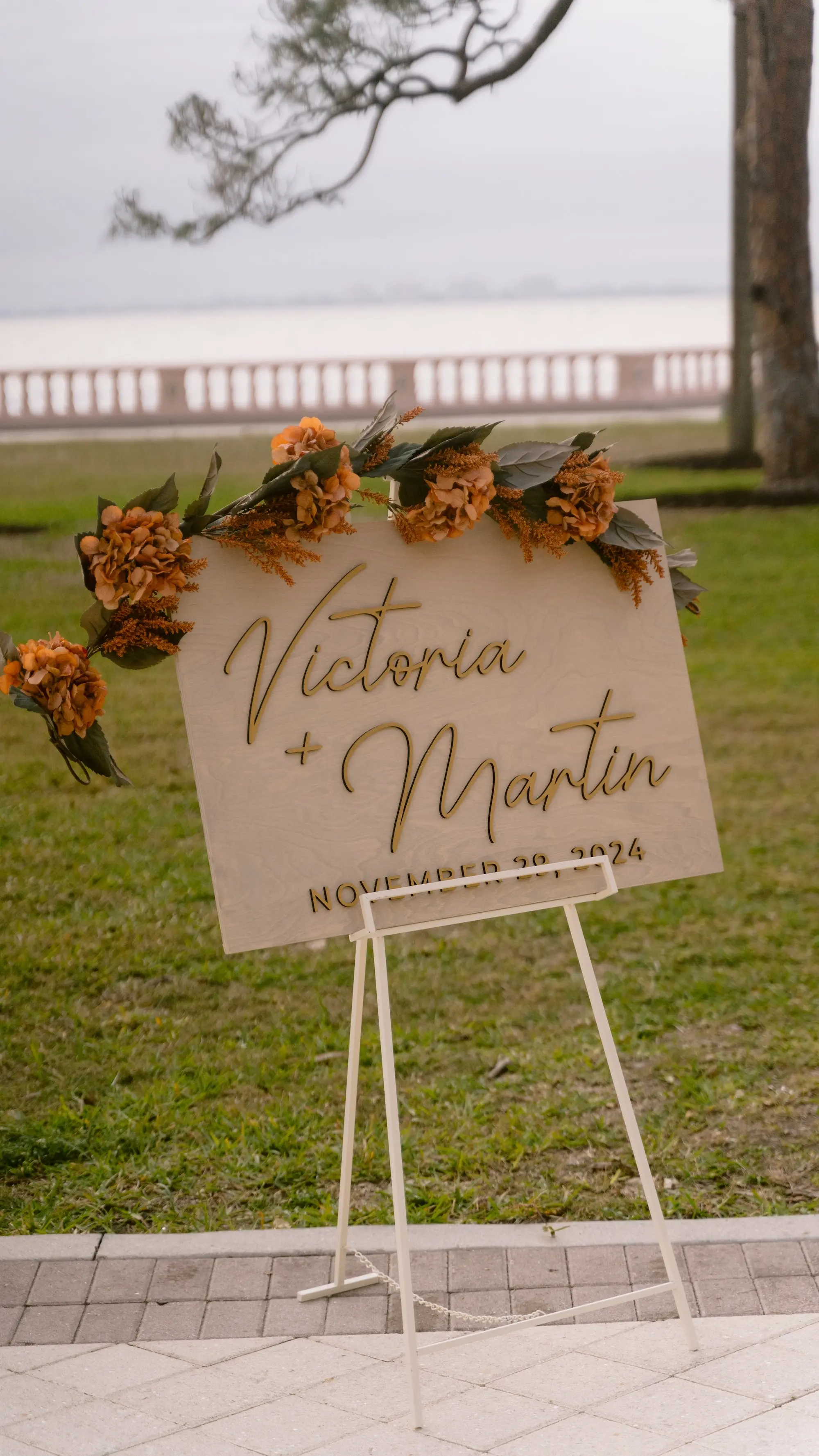 Wooden Welcome Wedding Sign Reception Decor Inspiration | Burnt Orange Fall Florals and Palms Garland Decor Ideas | Neutral Fall Wedding Color Palette Inspiration