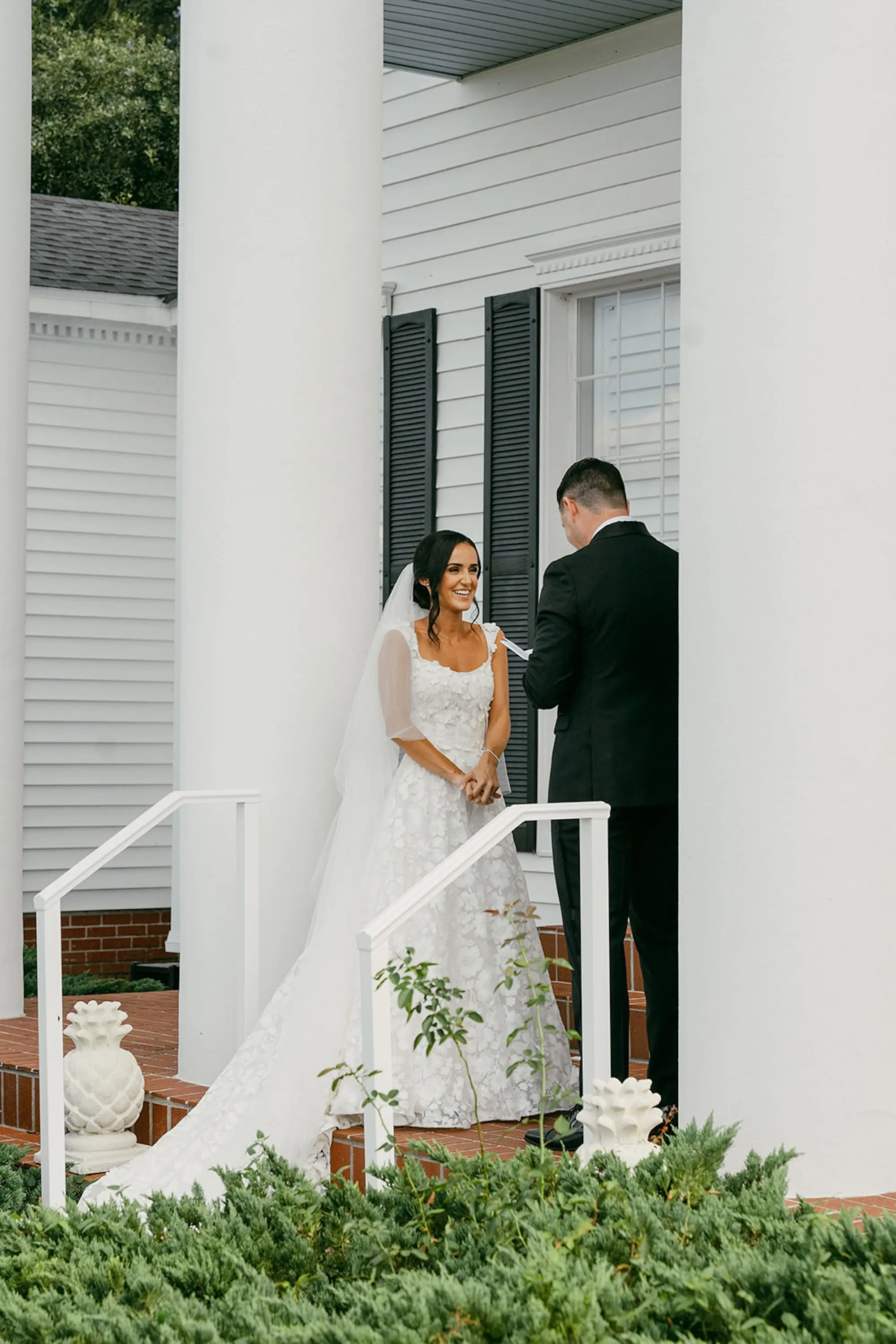 Bride and Groom Private Vow Reading Wedding Portrait | Low Bun with Face Framing Curls Bridal Hair and Cathedral Length Veil Inspiration | Timeless Natural Glam Makeup Ideas | Ybor Hair and Makeup Artist Adore Bridal Hair and Makeup