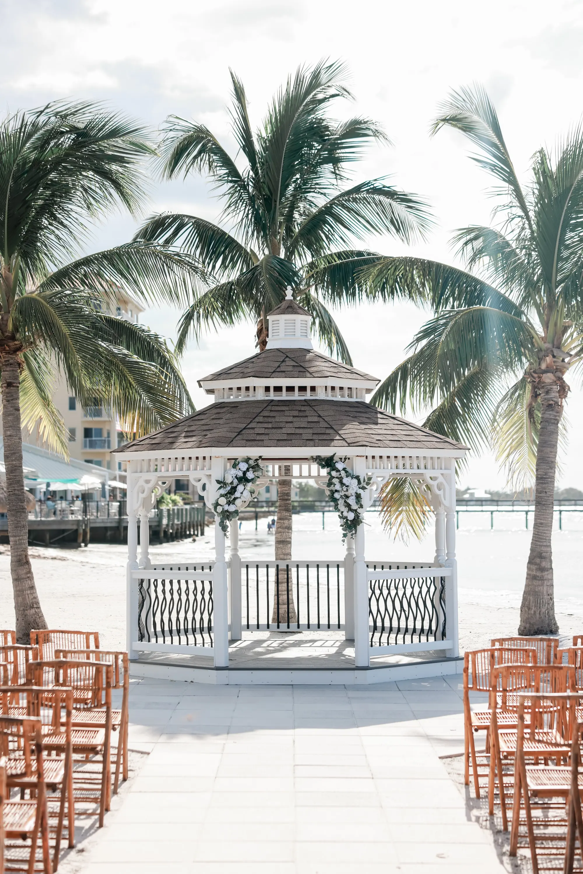 Outdoor Beach Wedding Ceremony Venue with Gazebo | Bamboo Wedding Ceremony Chairs Inspiration | St Pete Event Venue Isla Del Sol Yacht and Country Club | Tampa Bay Planner Planner Coastal Coordinating