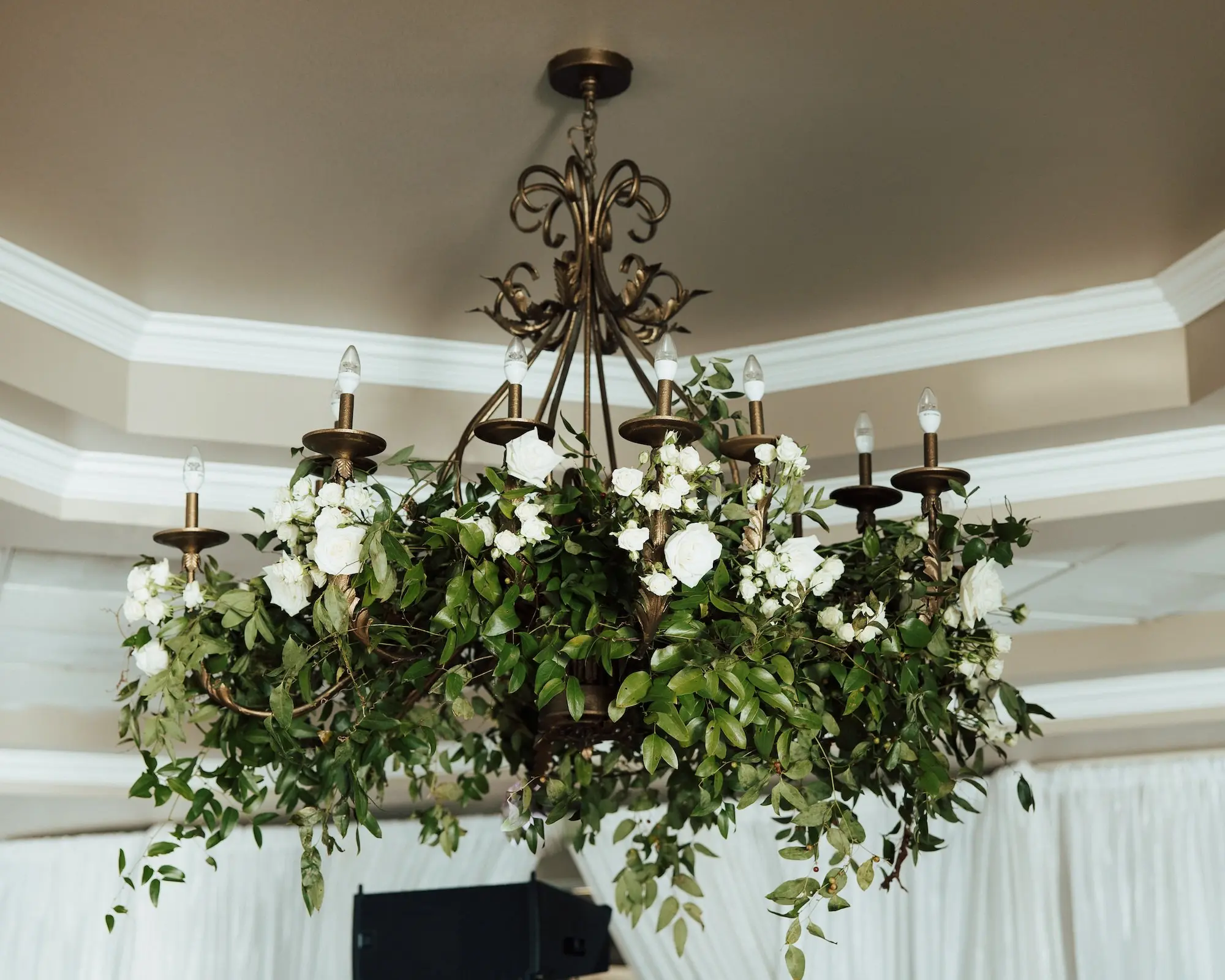 Luxurious Classic White Garden Theme Country Club Ballroom Wedding Reception | Eucalyptus Greenery with White Roses and Florals Wedding Reception Chandelier Decor Inspiration